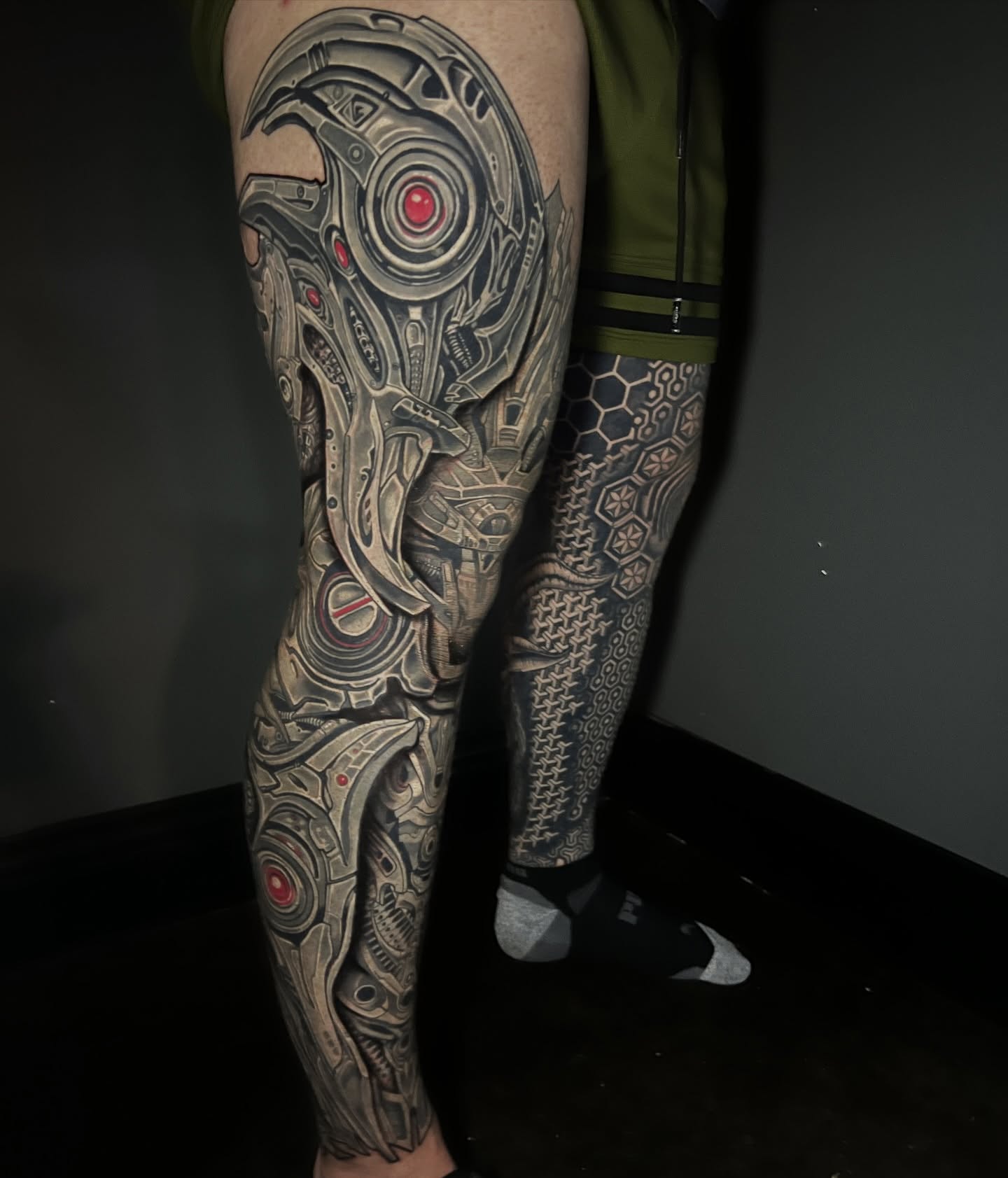 Mechanical robot head geometric tattoo on the leg by Kayden DiGiovanni, Addison, Texas
