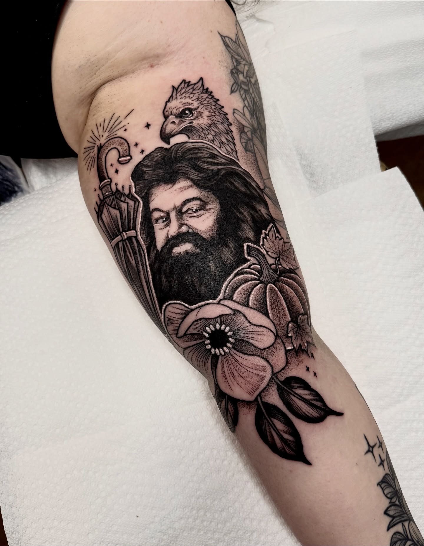 Bearded man with eagle realism tattoo on the forearm by ⚡️ Krissy Fabis ⚡️