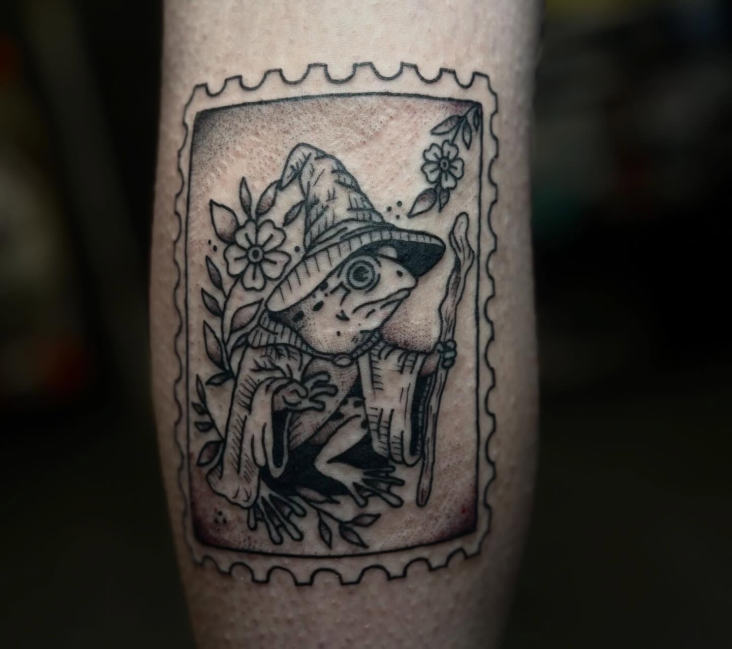 Frogs and flowers black and grey tattoo on the forearm by ππ©π’π΅ππ«π‘π―π ππ¬π«π’π°