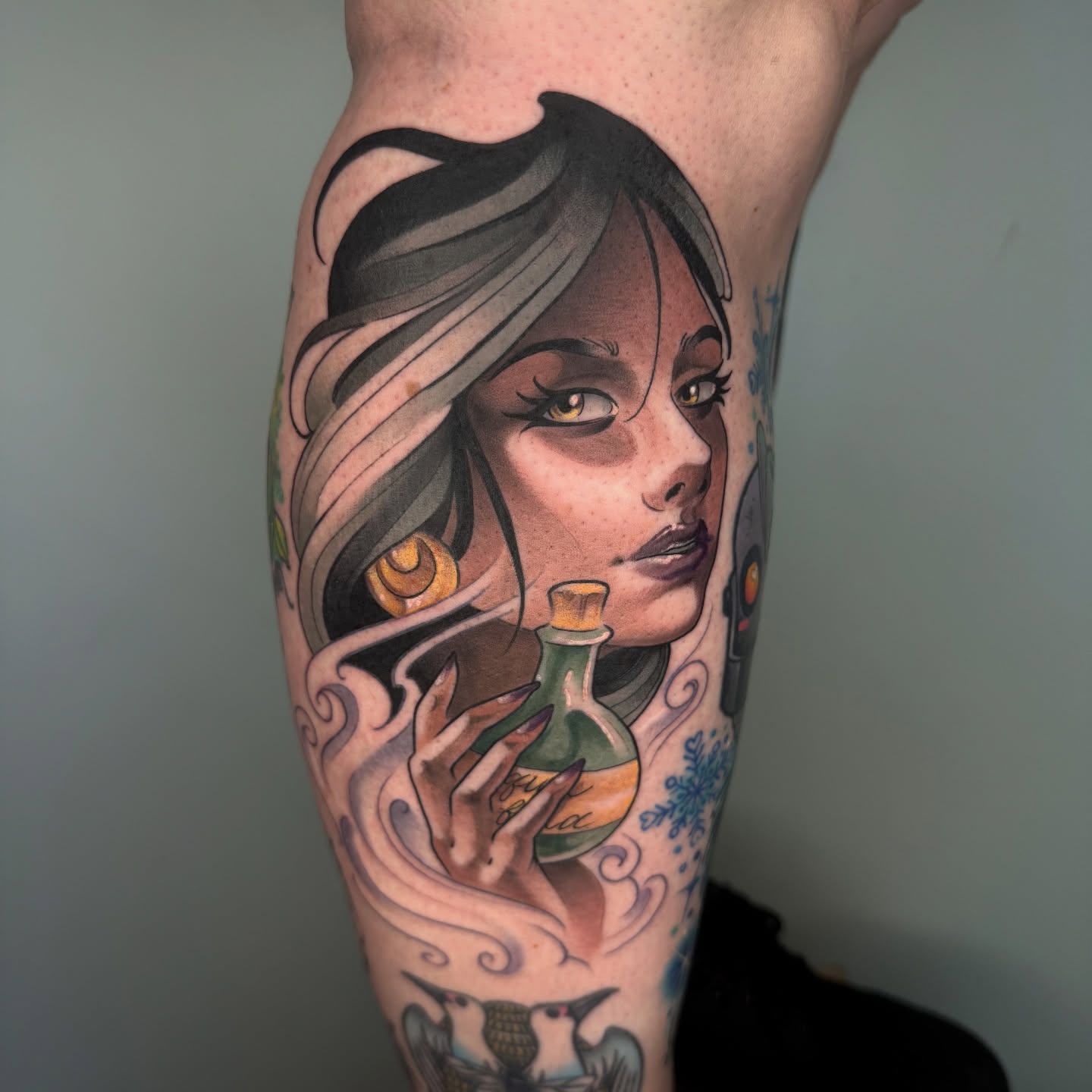 Woman with potion bottle realism tattoo on the forearm by Angel, Salt Lake City, Utah