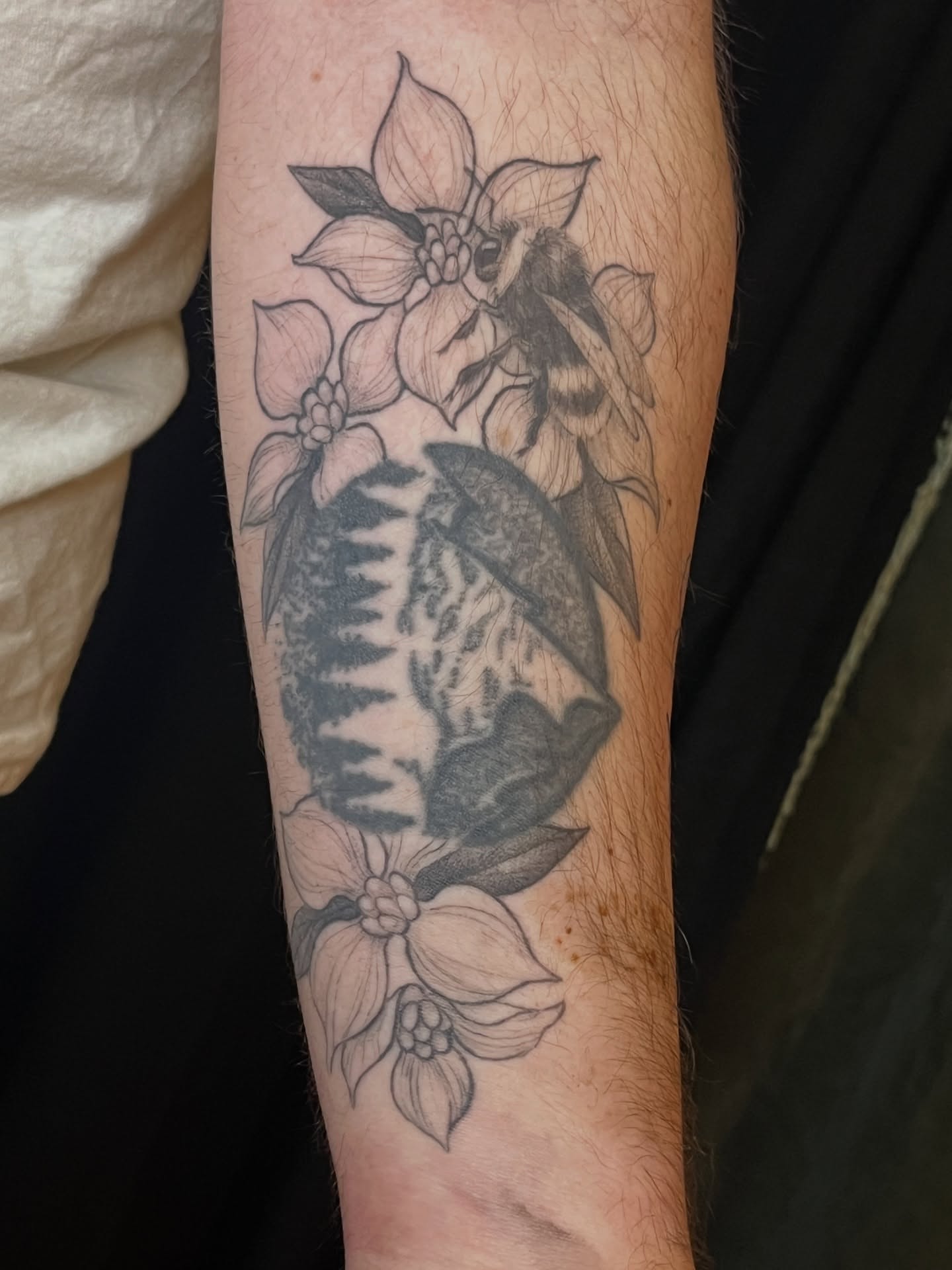 Butterfly and flowers black and grey tattoo on the forearm by BELLIE ✧ Tattoo Artist