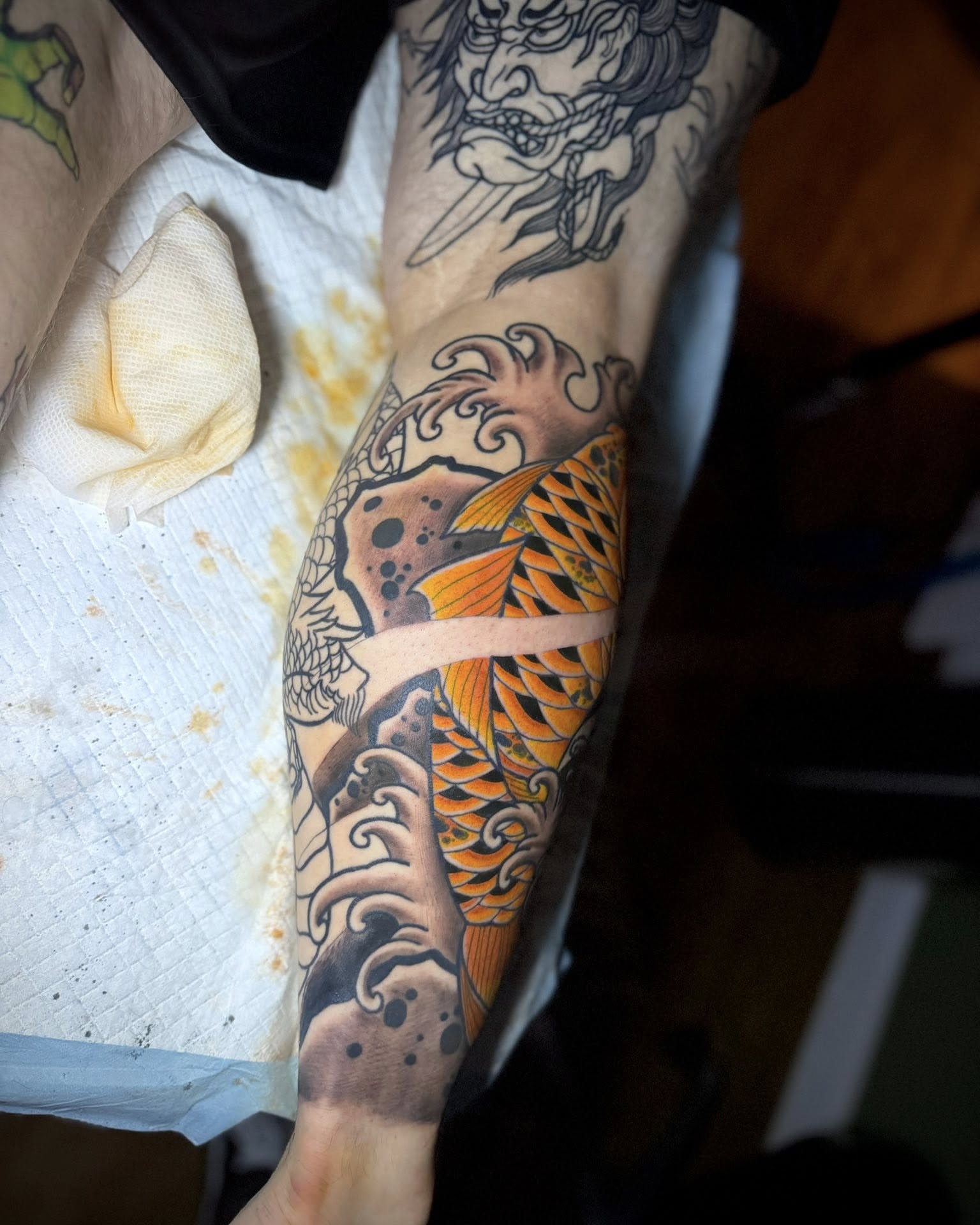 Koi fish japanese irezumi tattoo on the forearm by Corey Bailey, Stanton, Kentucky