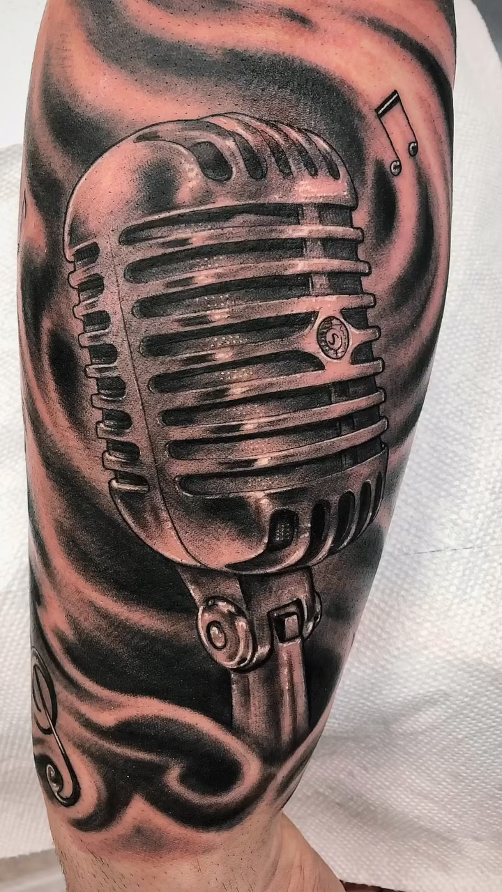 Vintage microphone realism tattoo by Daniel Fisher, Berlin, New Jersey
