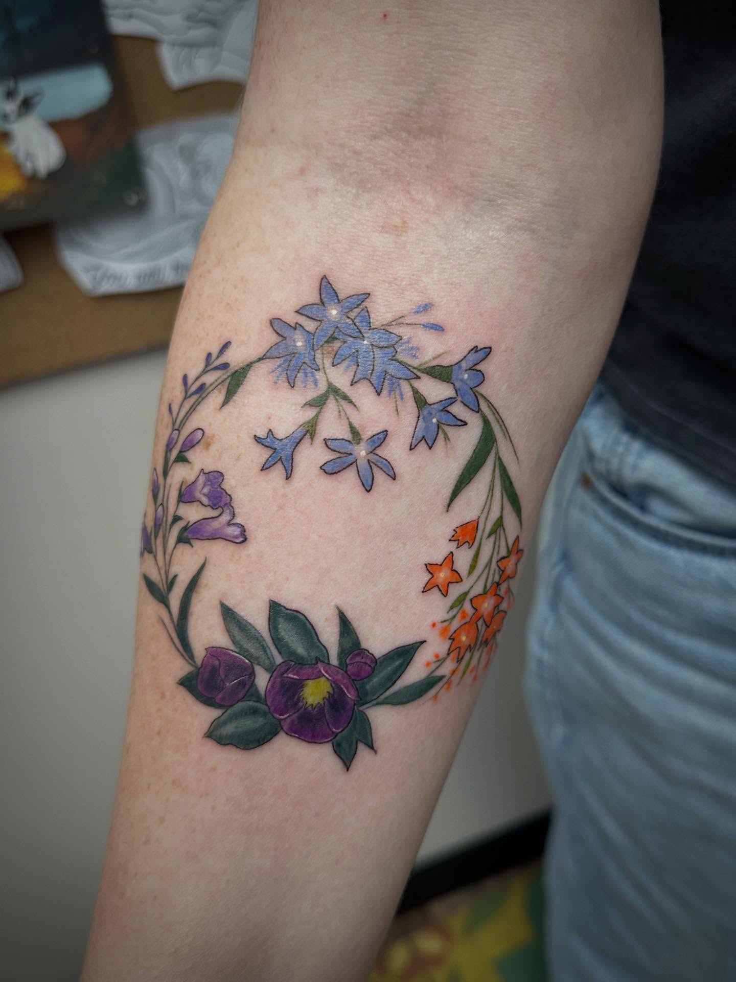 Floral wreath dotwork tattoo on the forearm by Heather Tattoos Danvers MA