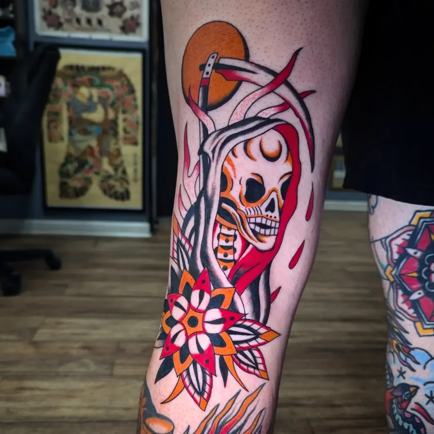 Skull and scythe American traditional tattoo on the leg by joseph palladino