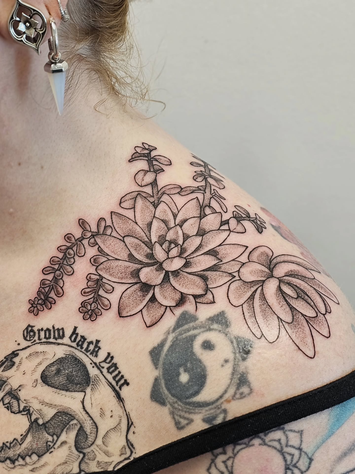 Succulent plant dotwork tattoo on the shoulder by Kylie Lund