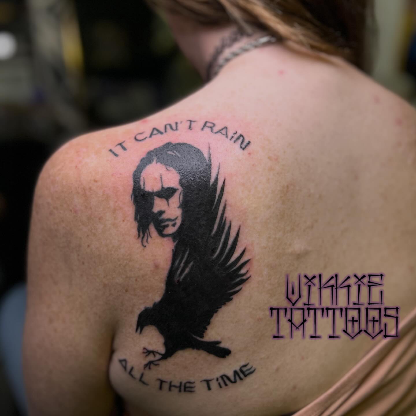 Crow and man black and grey tattoo on the back by Victoria Mendez