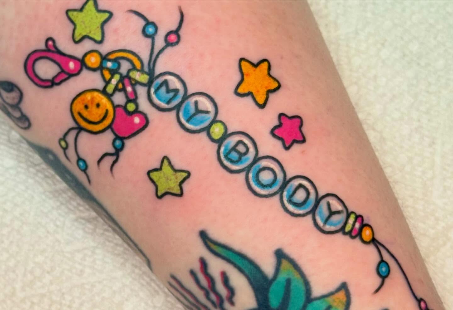 My body new school tattoo on the forearm by Painted Peach Tattooer