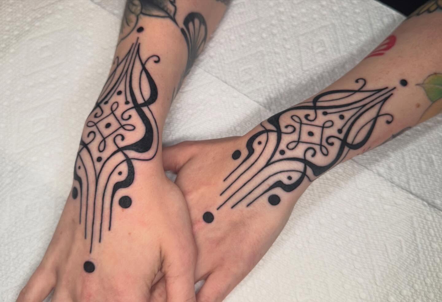 Abstract pattern dotwork tattoo on the forearm by Painted Peach Tattooer