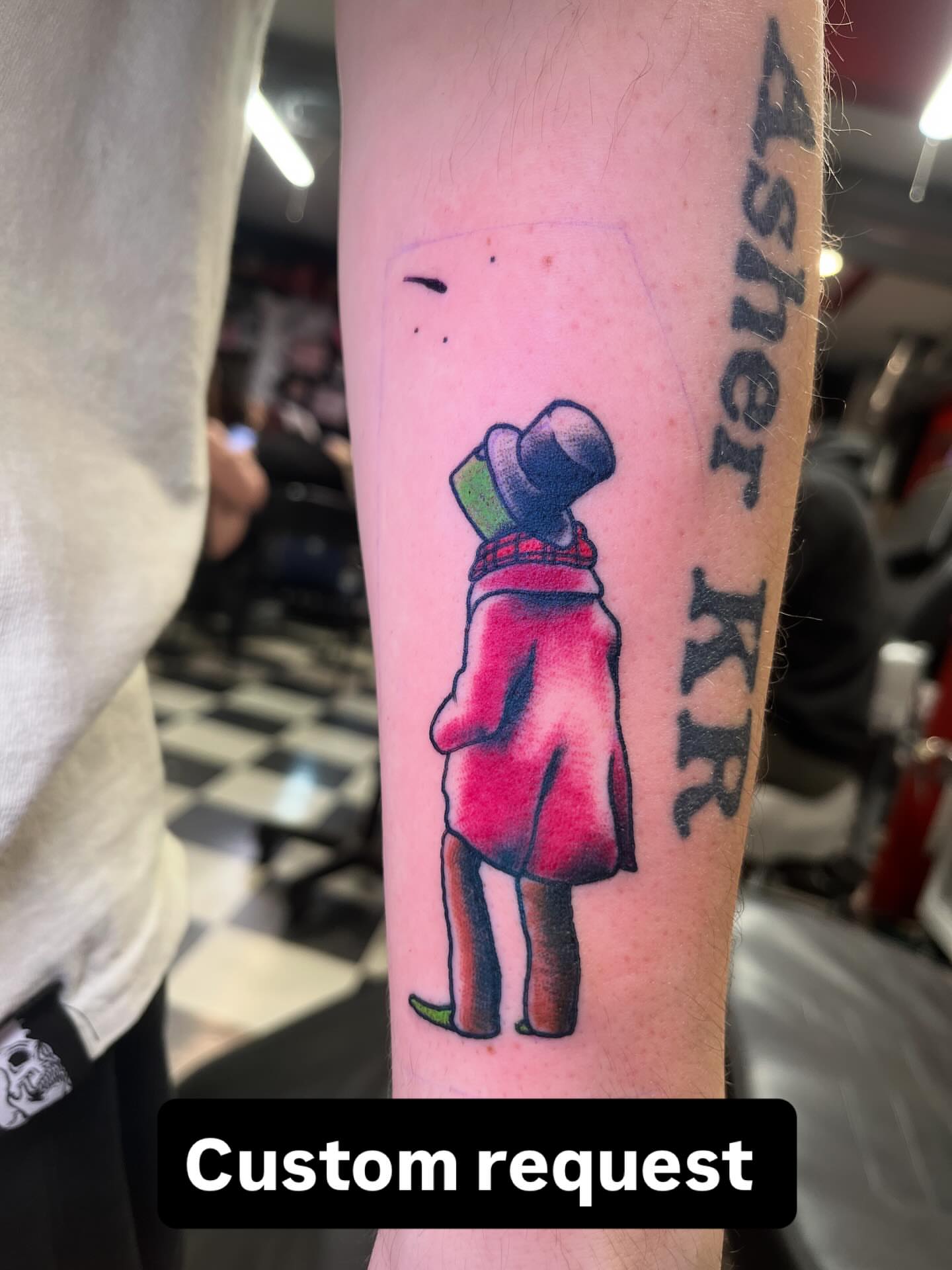 Coat-wearing figure new school tattoo on the forearm by Sean Swanson Tattoo Salem Oregon, Salem, Oregon