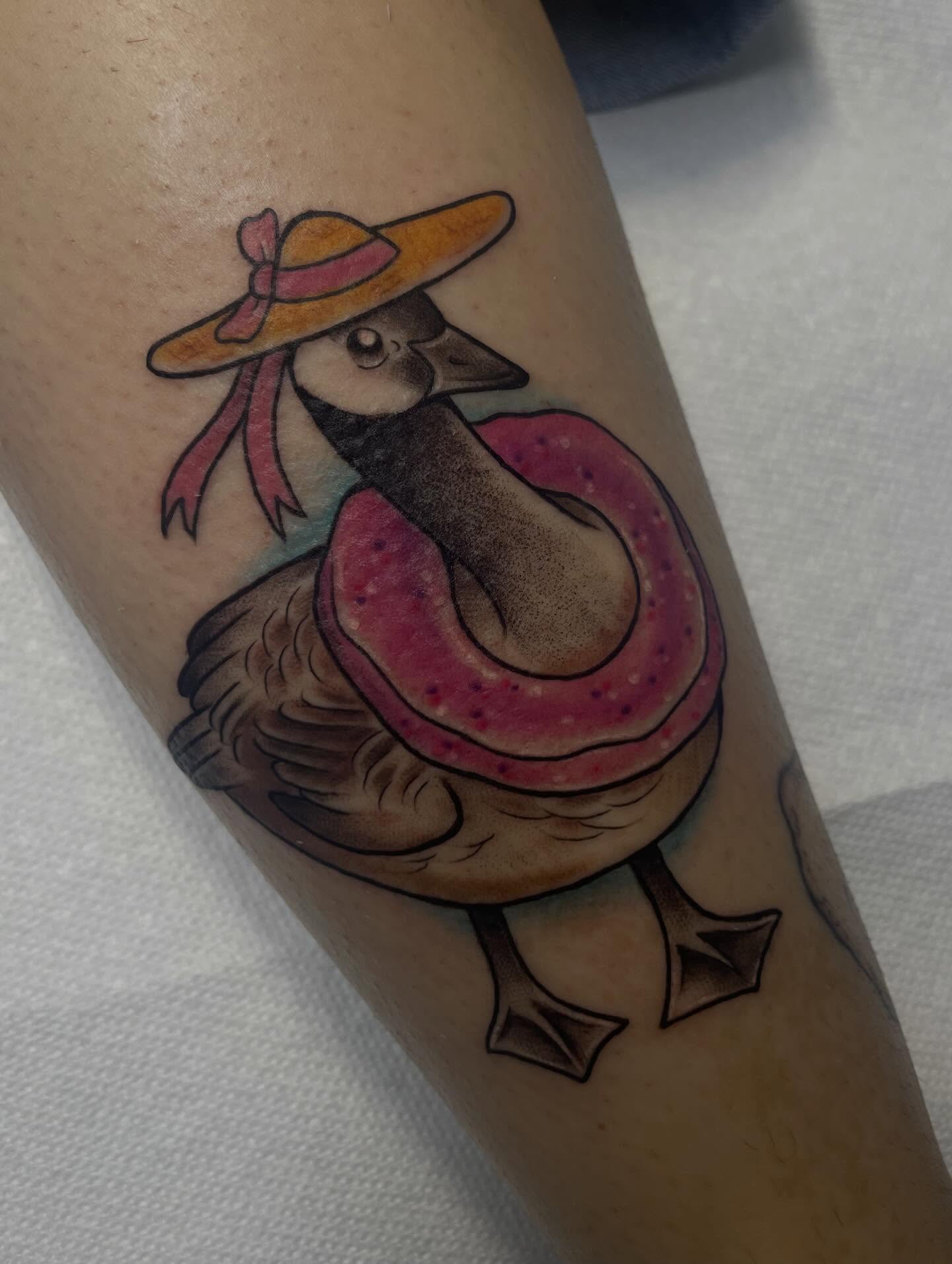 Flamingo wearing a hat American traditional tattoo on the forearm by Stevie Timmreck, Utica, Michigan