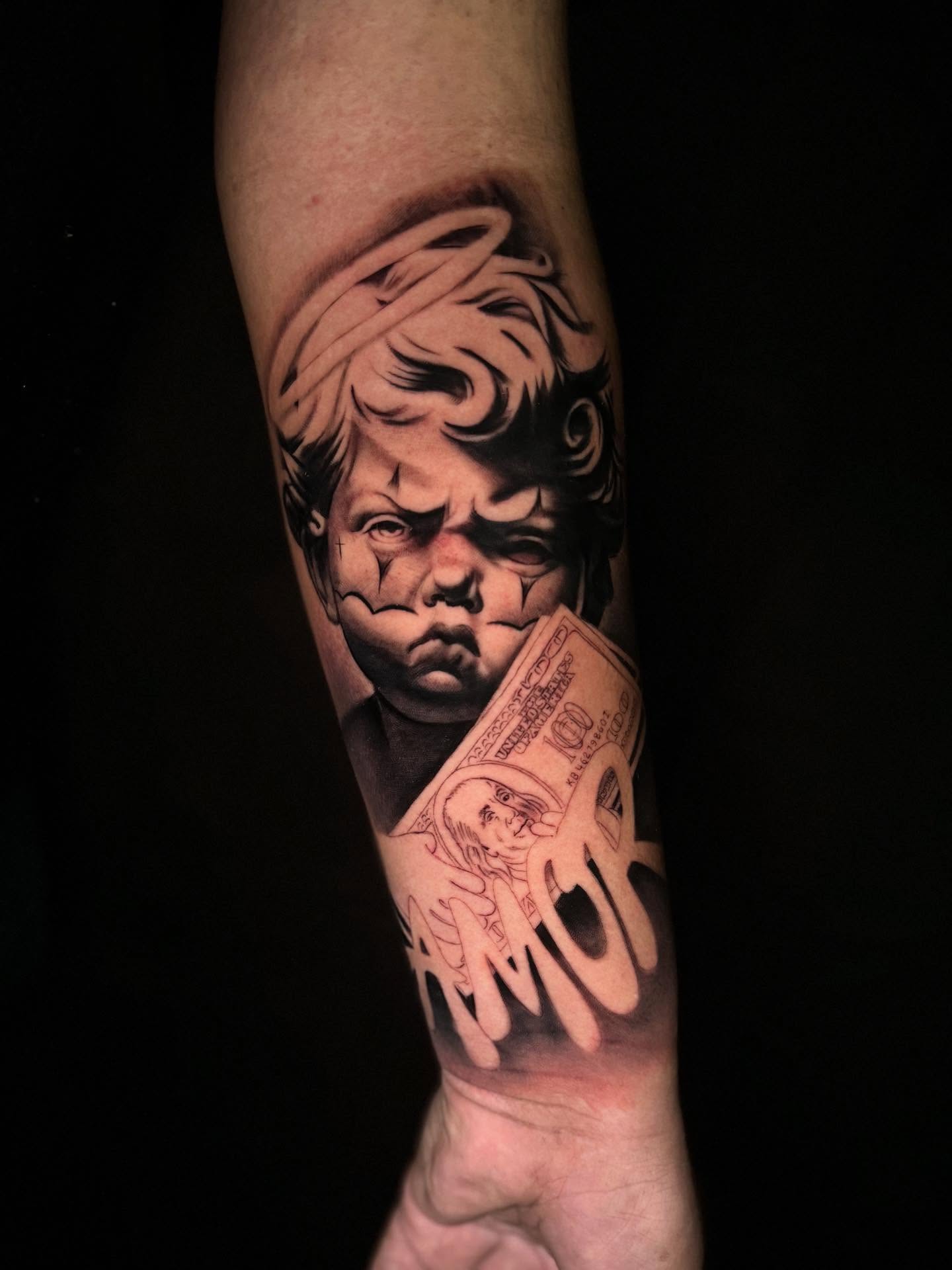 Child with halo realism tattoo on the forearm by Jose Mendoza Torres