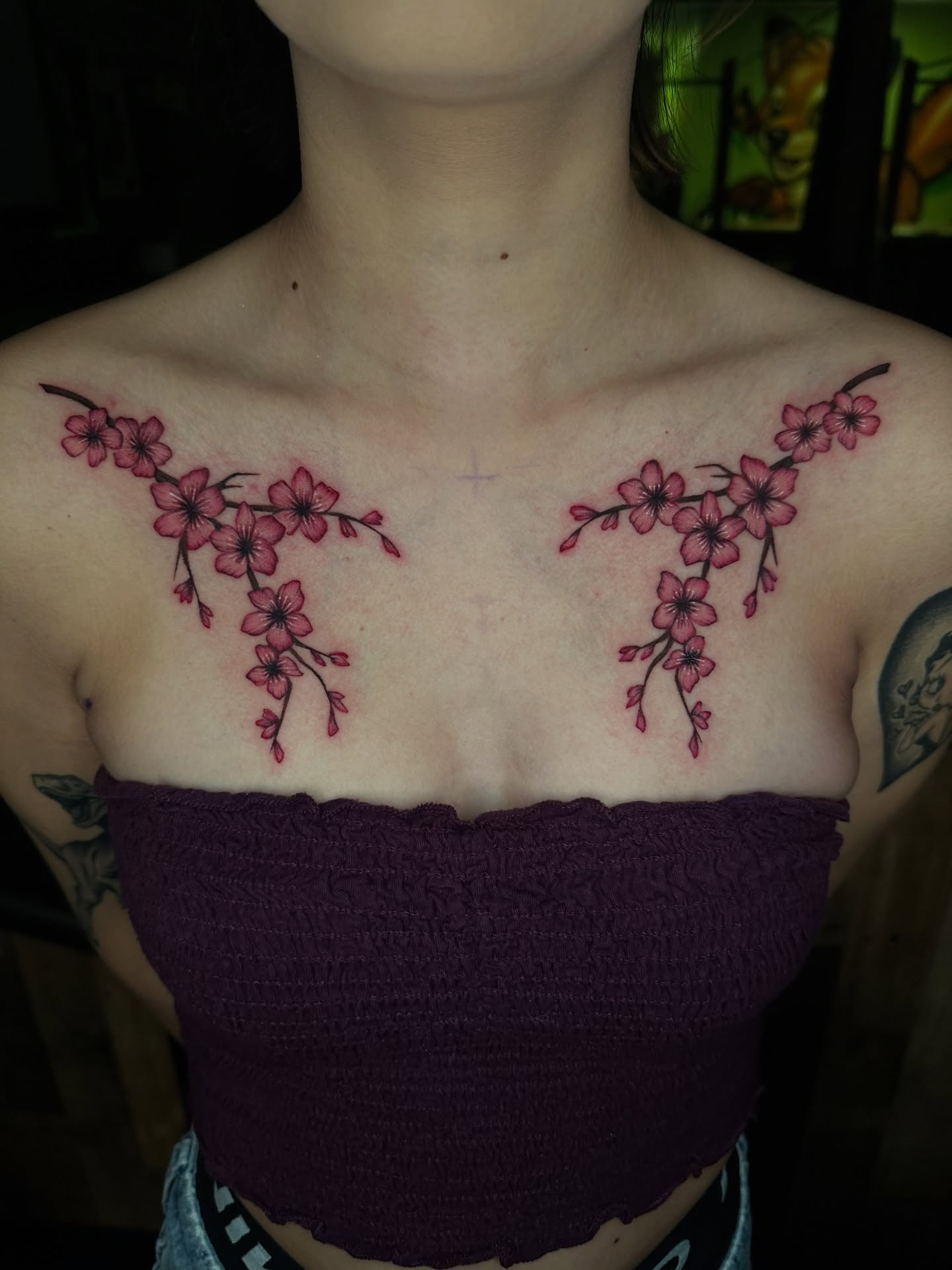 Cherry blossoms dotwork tattoo on the chest by Sam Minneci