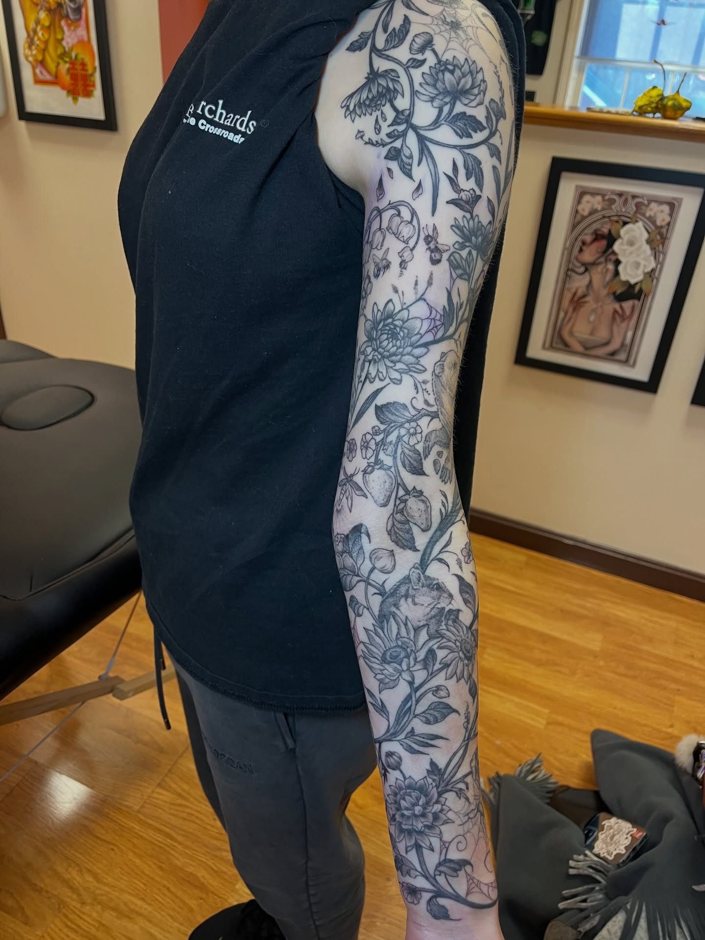 Floral black and grey tattoo on the forearm by Gianna Calisi