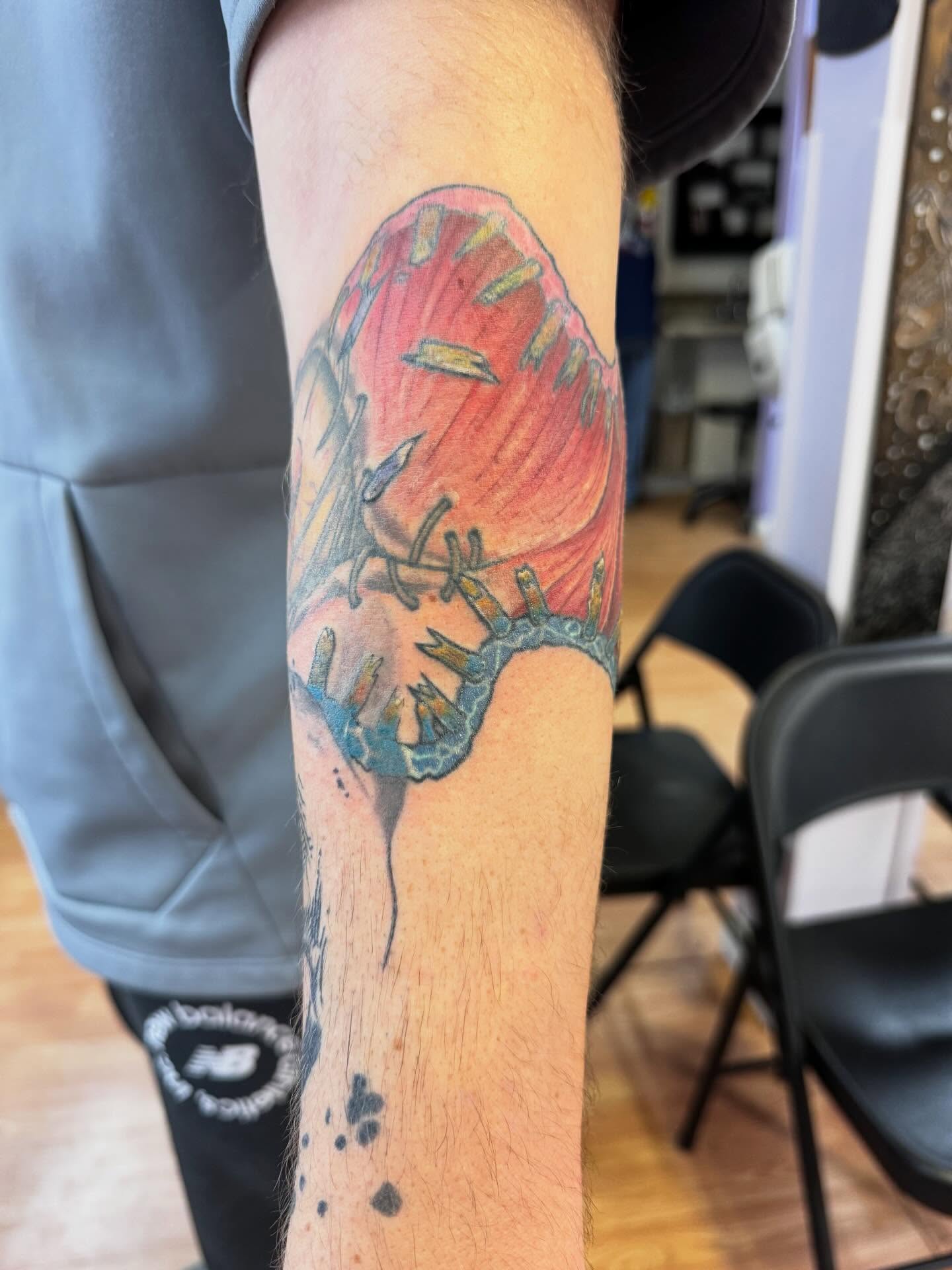 Abstract butterfly dotwork tattoo on the forearm by Justin Fiveson