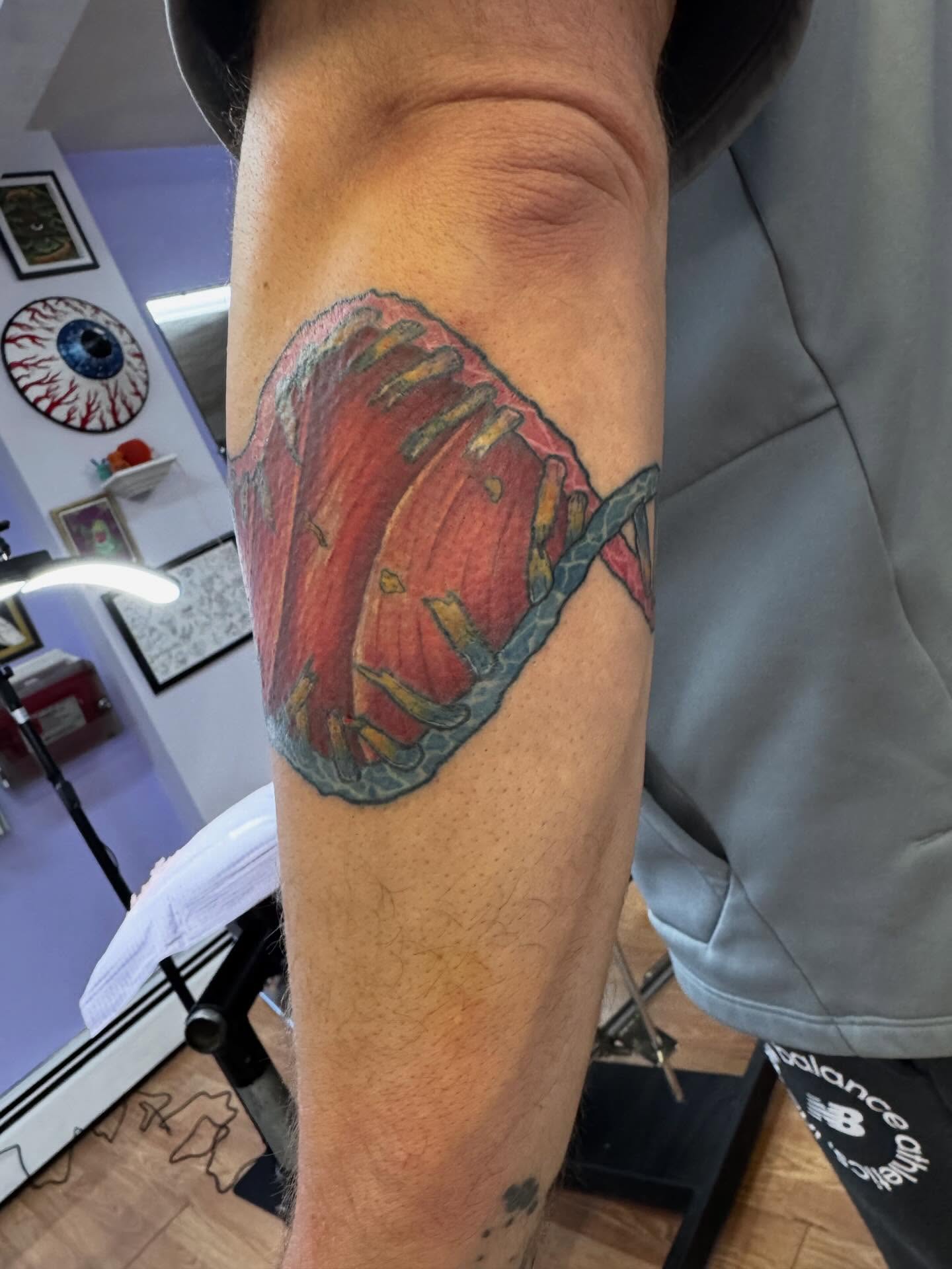 Ribcage realism tattoo on the forearm by Justin Fiveson