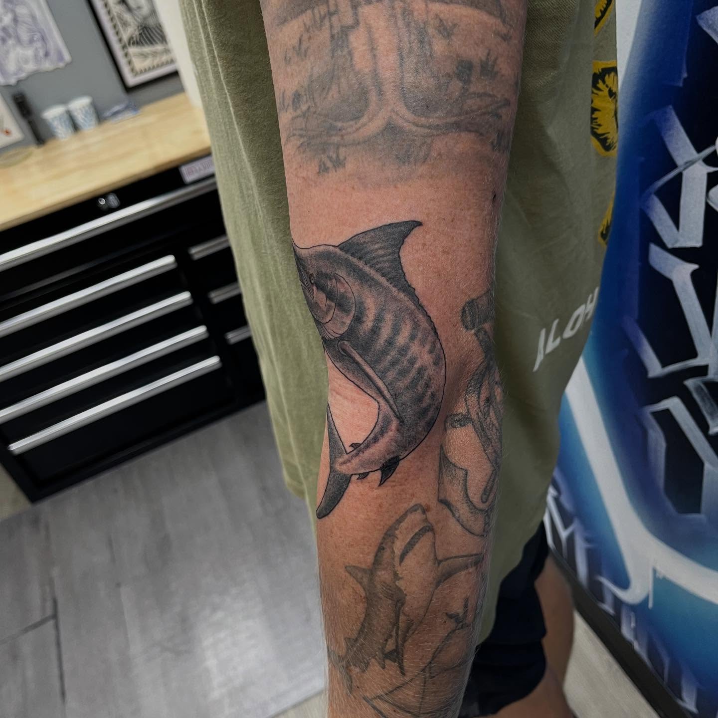 Fish black and grey tattoo on the forearm by Franky Sharpz