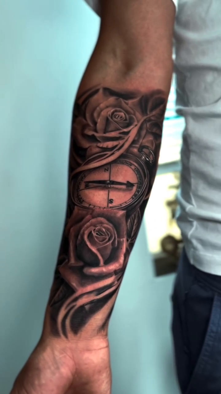 Roses and compass realism tattoo by Miguel Garcia