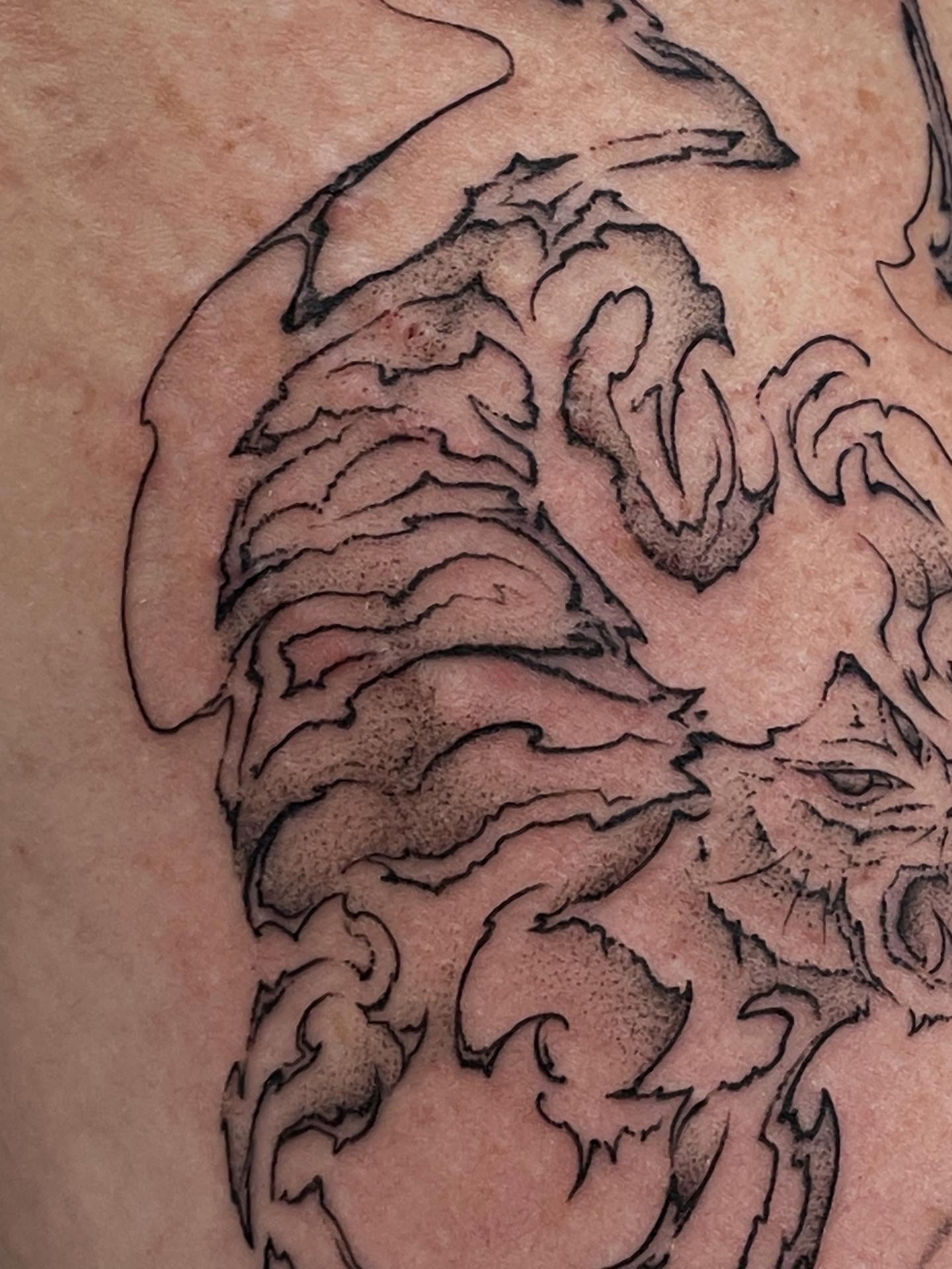 Dragon black and grey tattoo on the thigh by Marjeline González🌈🌞