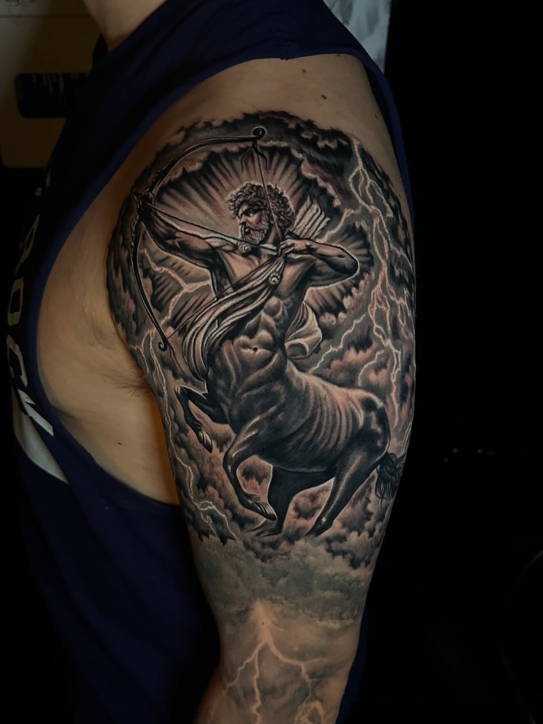 Centaur archer with lightning realism tattoo on the upper arm by Omar Sheriff Herrera
