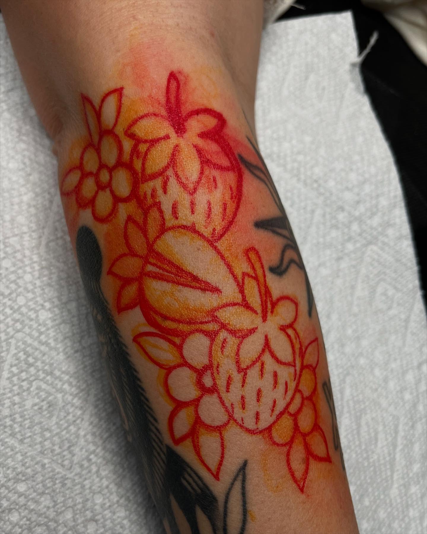 Floral arrangement new school tattoo on the forearm by Kayla Faircloth, Charlotte, North Carolina
