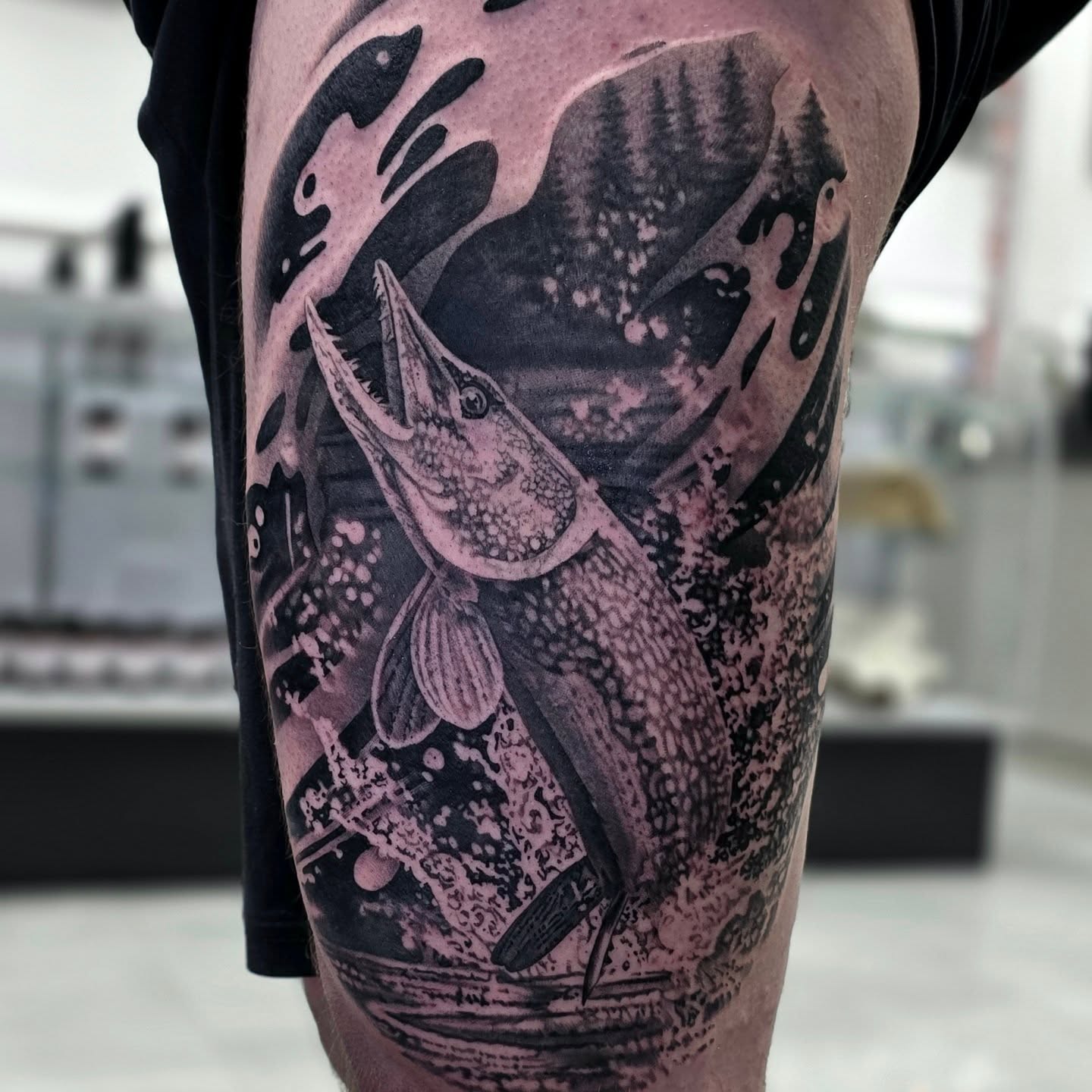 Pike jumping dotwork tattoo on the thigh by Julia Oravets