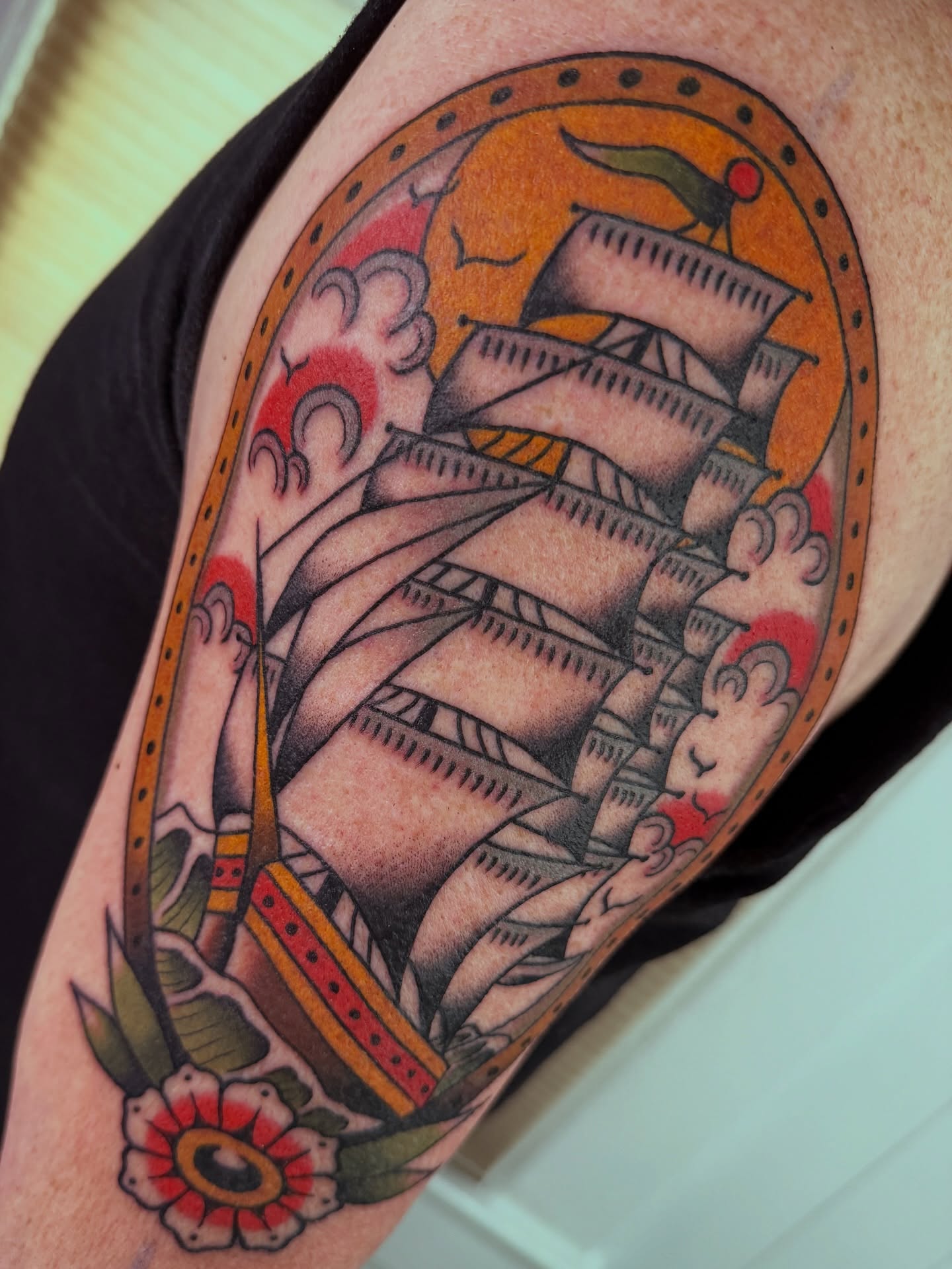 Ship sailing American traditional tattoo on the forearm by Cory Craft