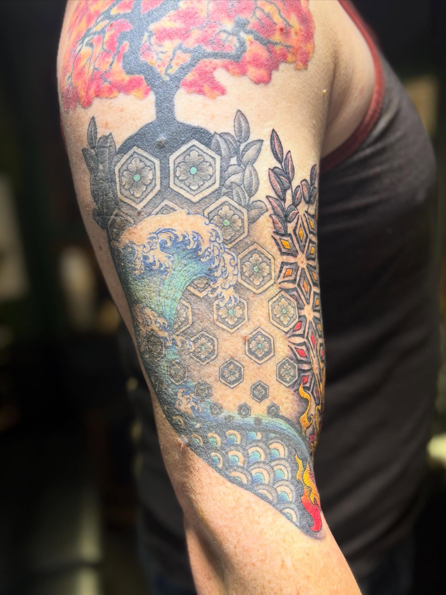 Tree and wave japanese irezumi tattoo on the forearm by Olivia Buch