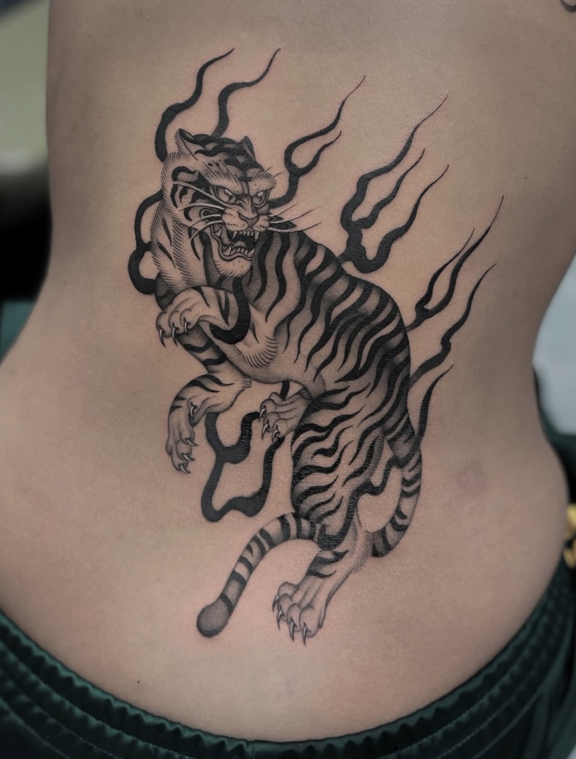 Tiger black and grey tattoo on the torso by Gold Coast Tattoo Artist, Gold Coast, Queensland