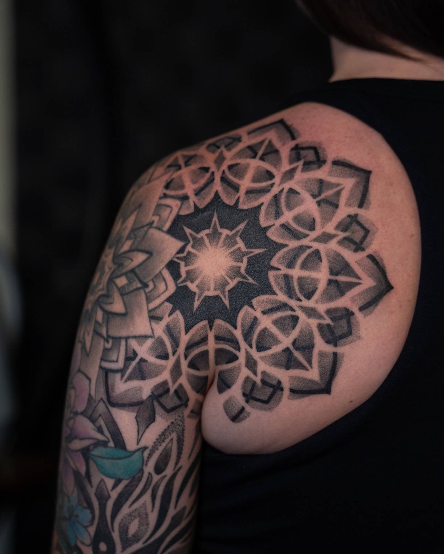 Geometric mandala dotwork tattoo on the shoulder by Chris Estrada