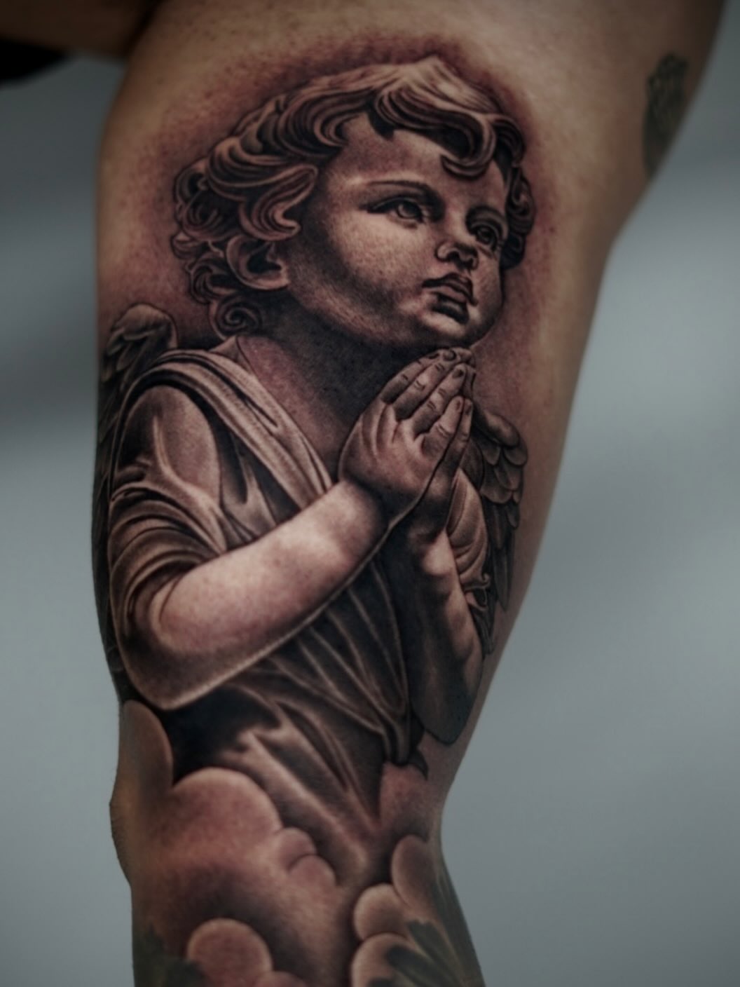 Praying angel realism tattoo on the forearm by DREW ROMERO - Colorado Tattoo Artist, Pueblo, Colorado