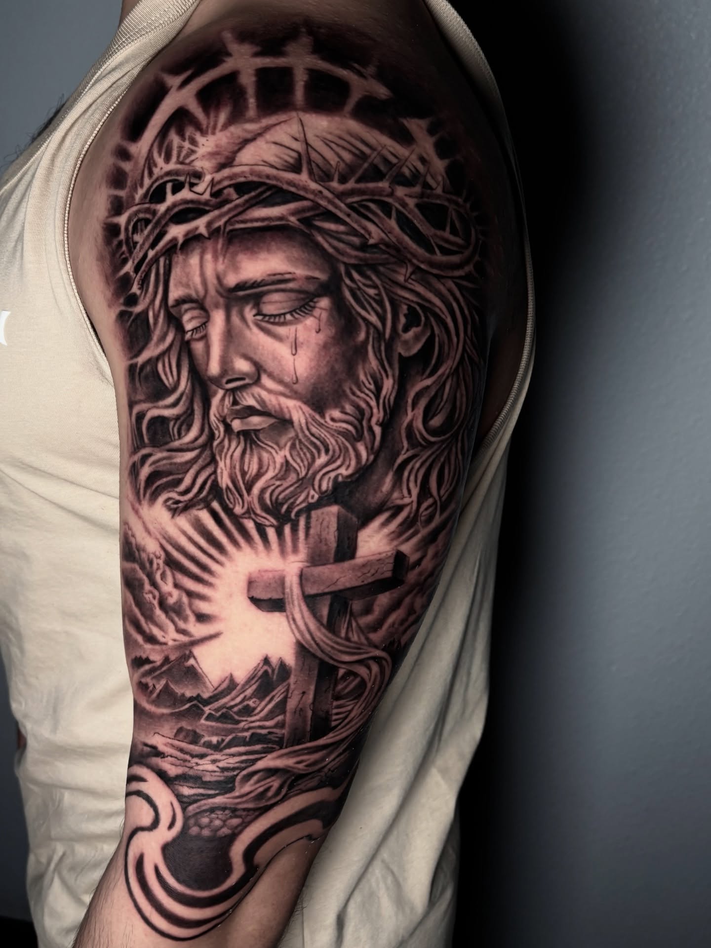 Jesus Christ realism tattoo on the forearm by Dave