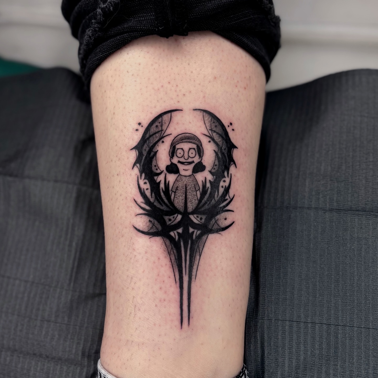 Anime character dotwork tattoo on the forearm by Lauren Dempsey, Dearborn, Michigan
