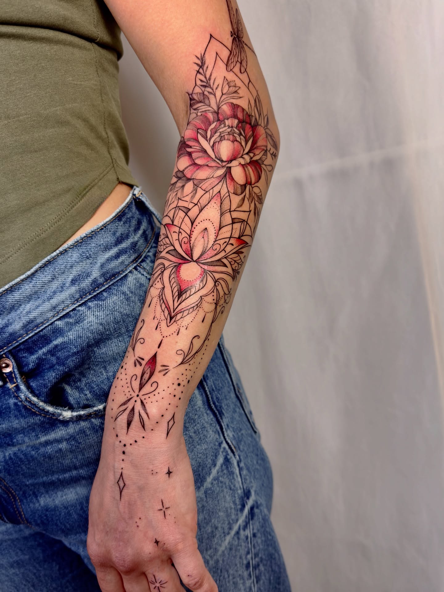 Floral bouquet dotwork tattoo on the forearm by Tattoo Yulia Kononenko