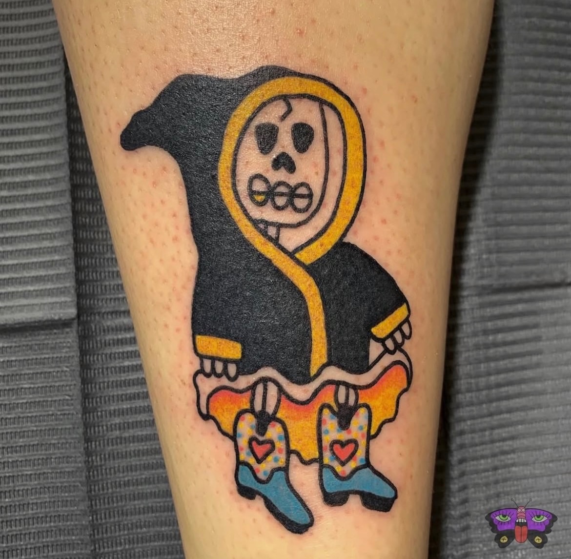 Skull in hoodie new school tattoo on the forearm by Jess Koala, San Francisco, California