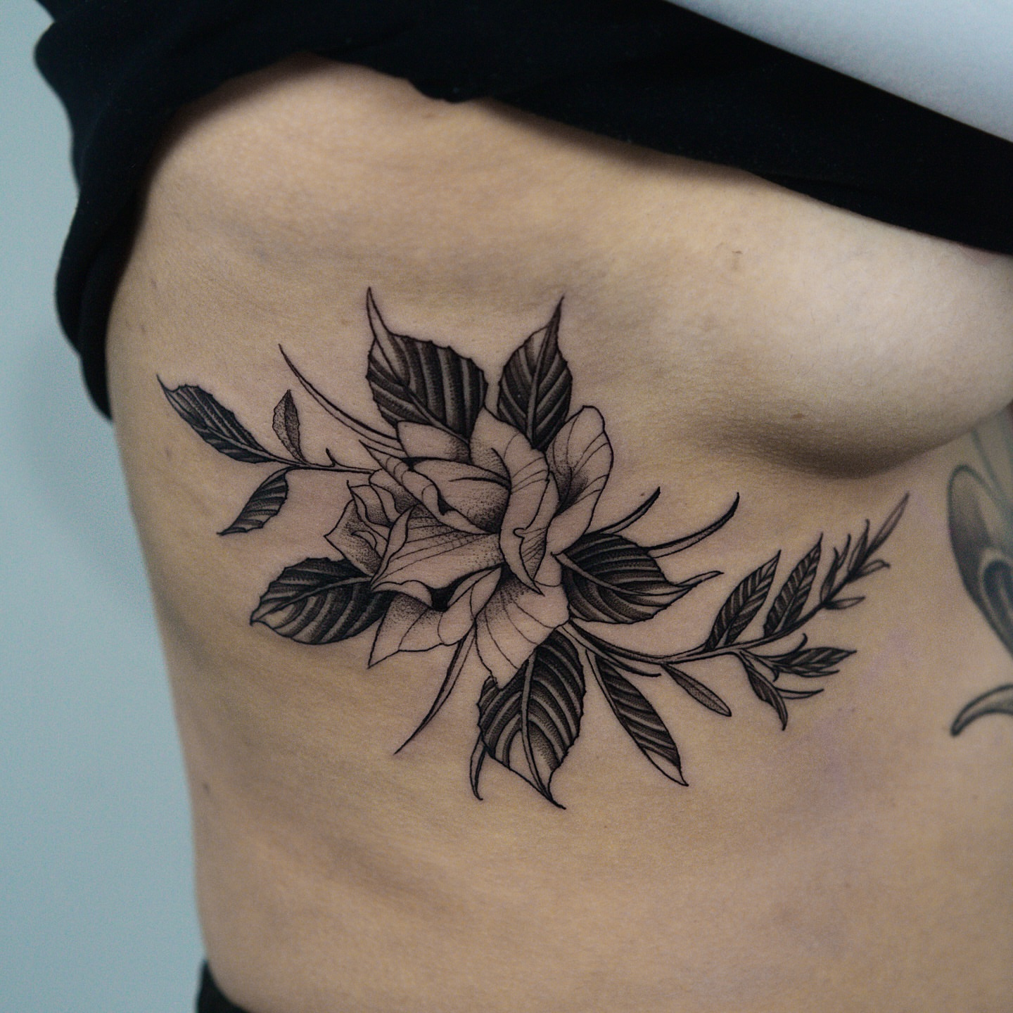 Floral bouquet dotwork tattoo on the ribs by H I R A  L U P E - tattoo artist, Oakland, California