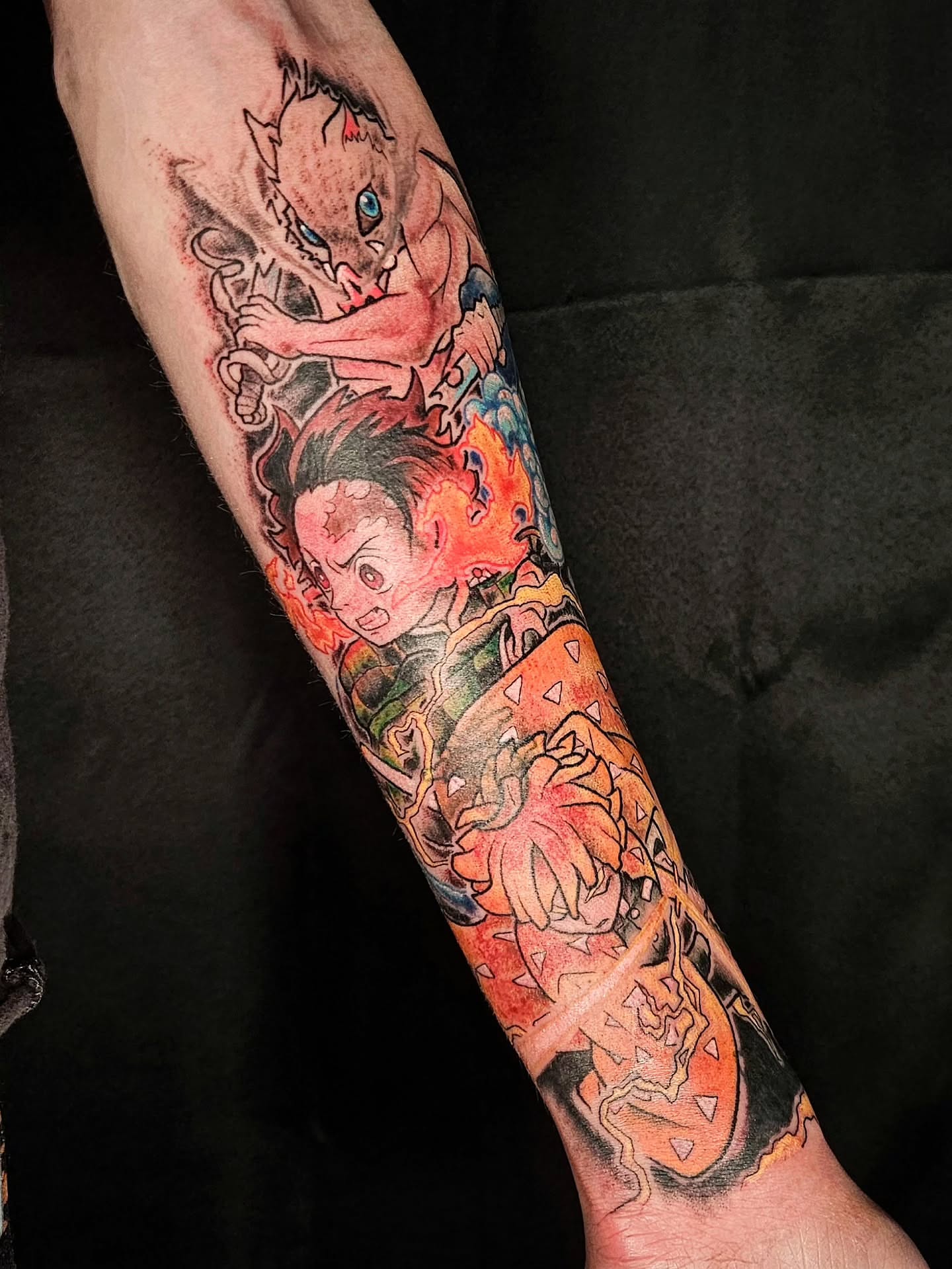 Demon and warrior japanese irezumi tattoo on the forearm by Damian Eames