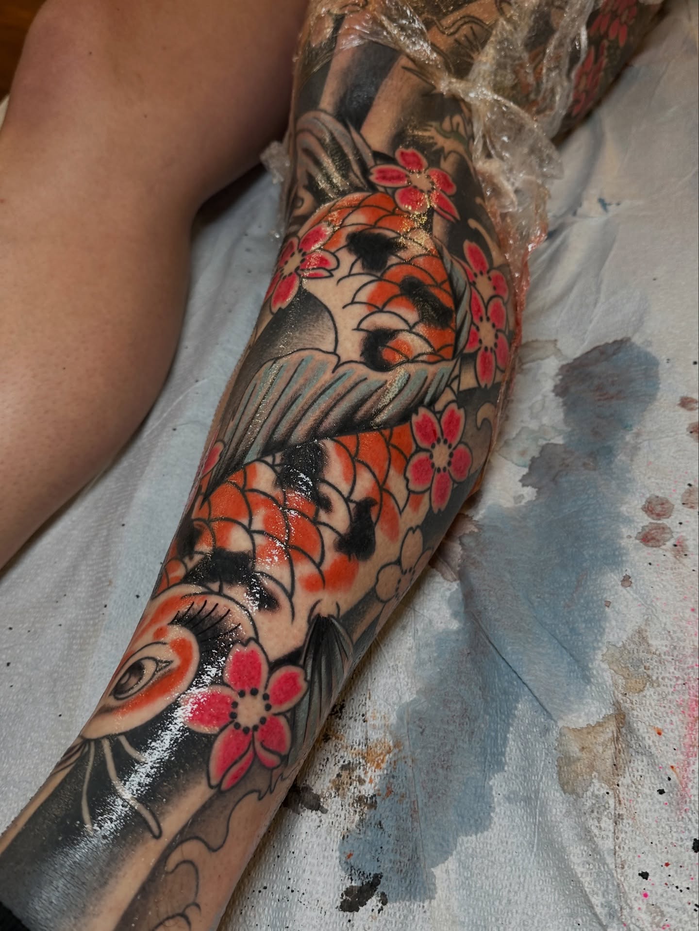 Koi fish and cherry blossoms japanese irezumi tattoo on the forearm by Sequoia Rose, Portland, Oregon
