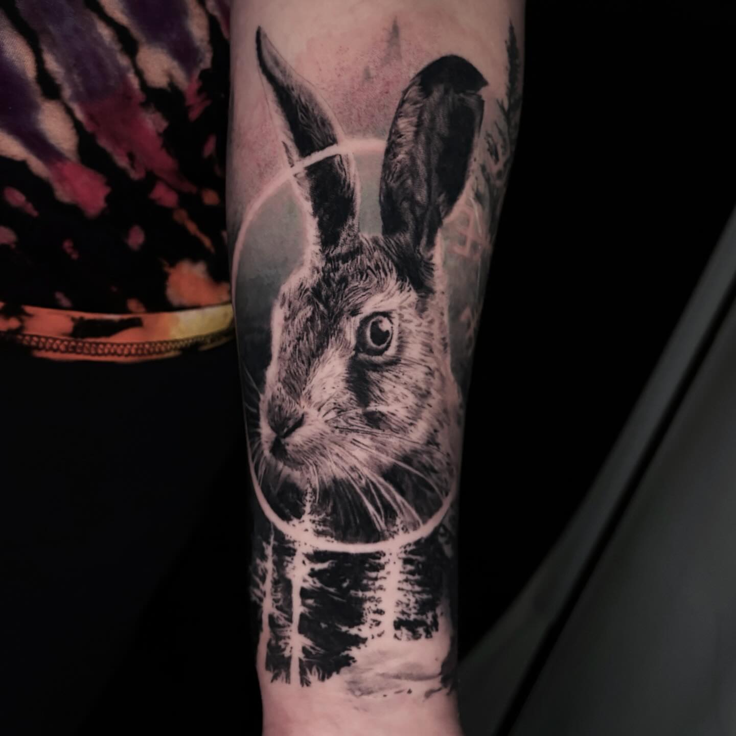Rabbit realism tattoo on the forearm by Yu Chen