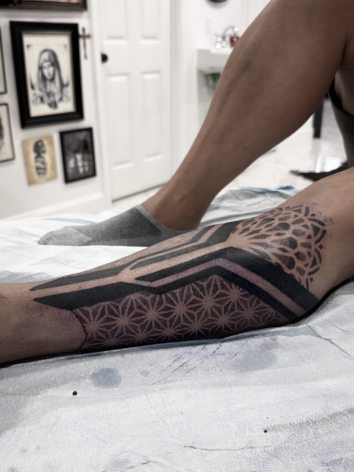 Geometric pattern geometric tattoo on the calf by Shannon Misitano