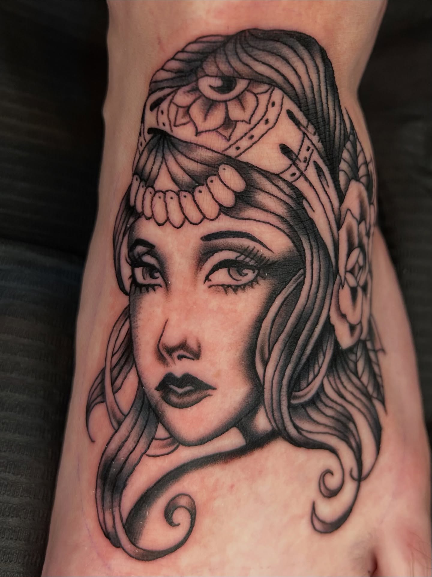 Woman's face American traditional tattoo on the forearm by Kurt, Somerville, Massachusetts
