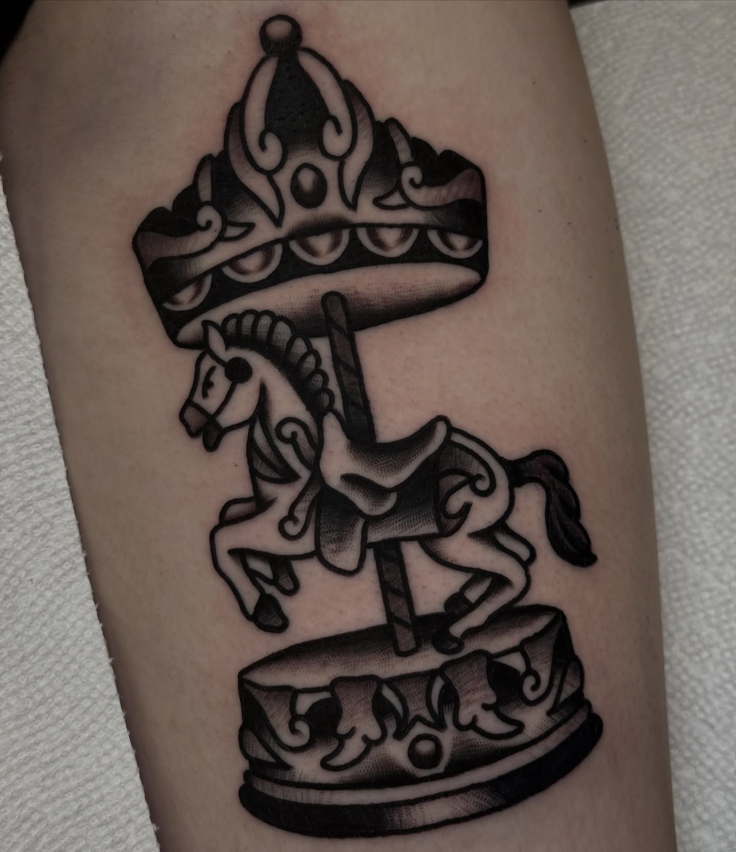 Carousel horse black and grey tattoo on the forearm by ๐ฎ๐๐๐๐ ๐ญ๐๐๐๐๐