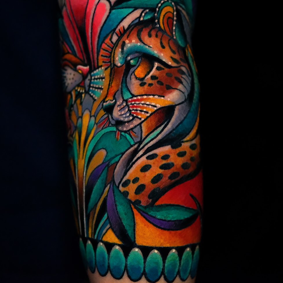Jaguar American traditional tattoo on the forearm by Don Boos Tattoos
