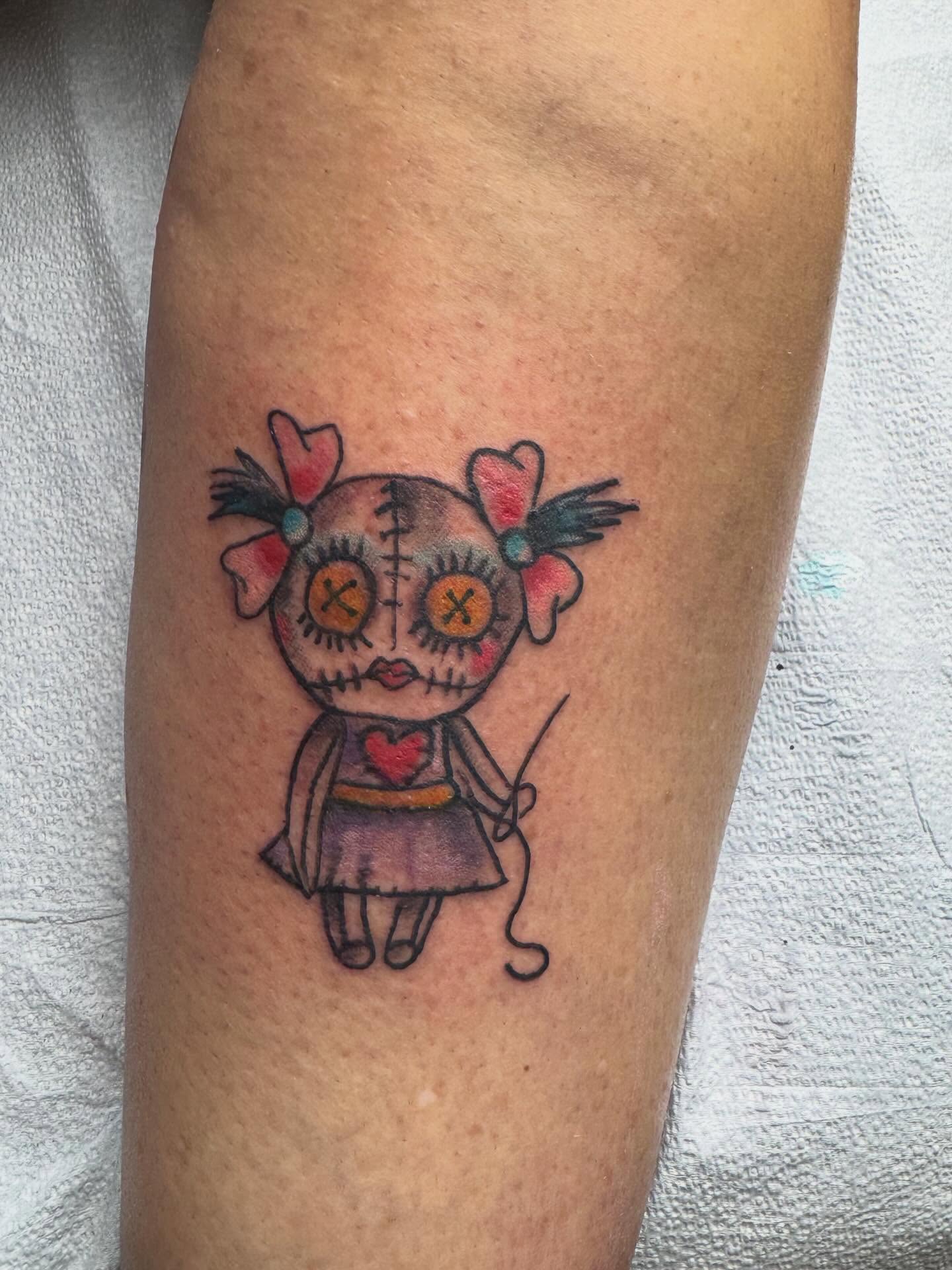 Doll American traditional tattoo on the forearm by @brocks_tatt_attic_, New Orleans, Louisiana