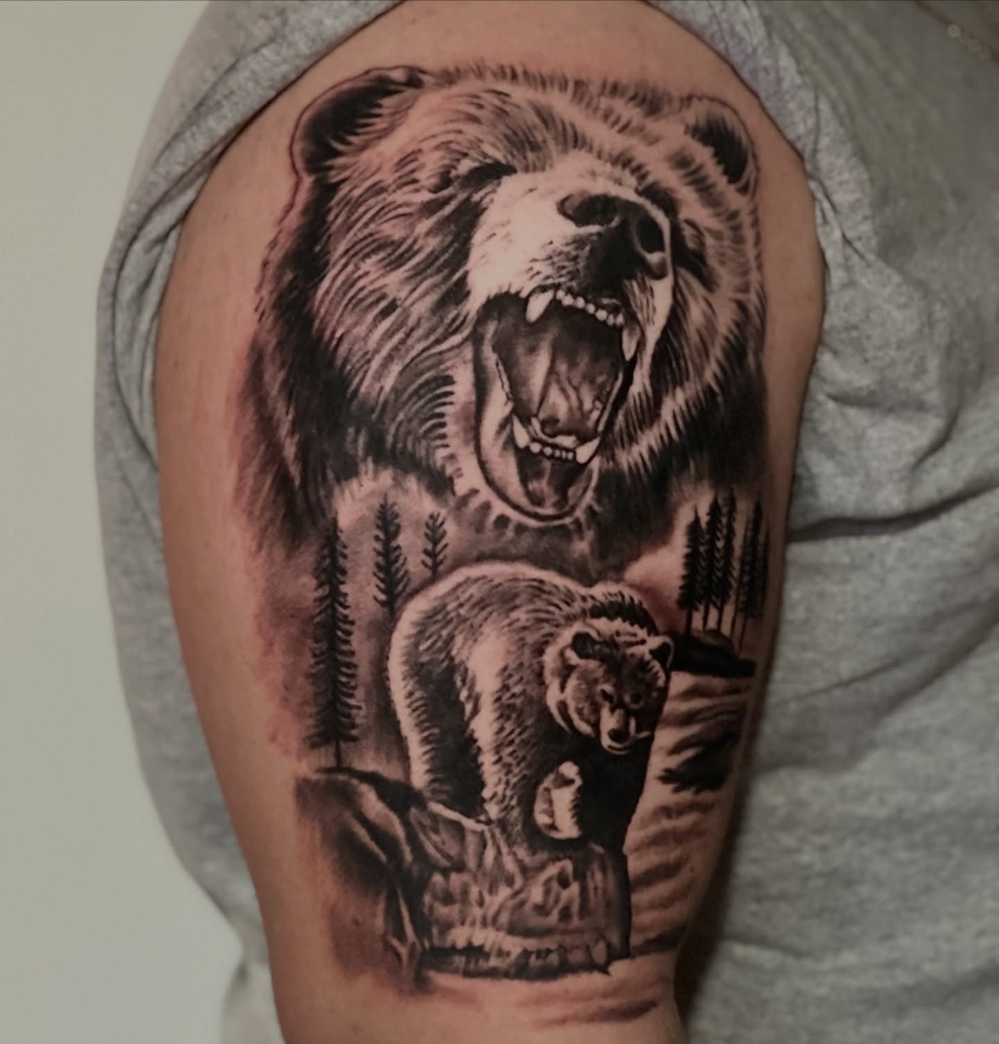 Grizzly bears realism tattoo on the upper arm by InkbyEase, Wayne, New Jersey