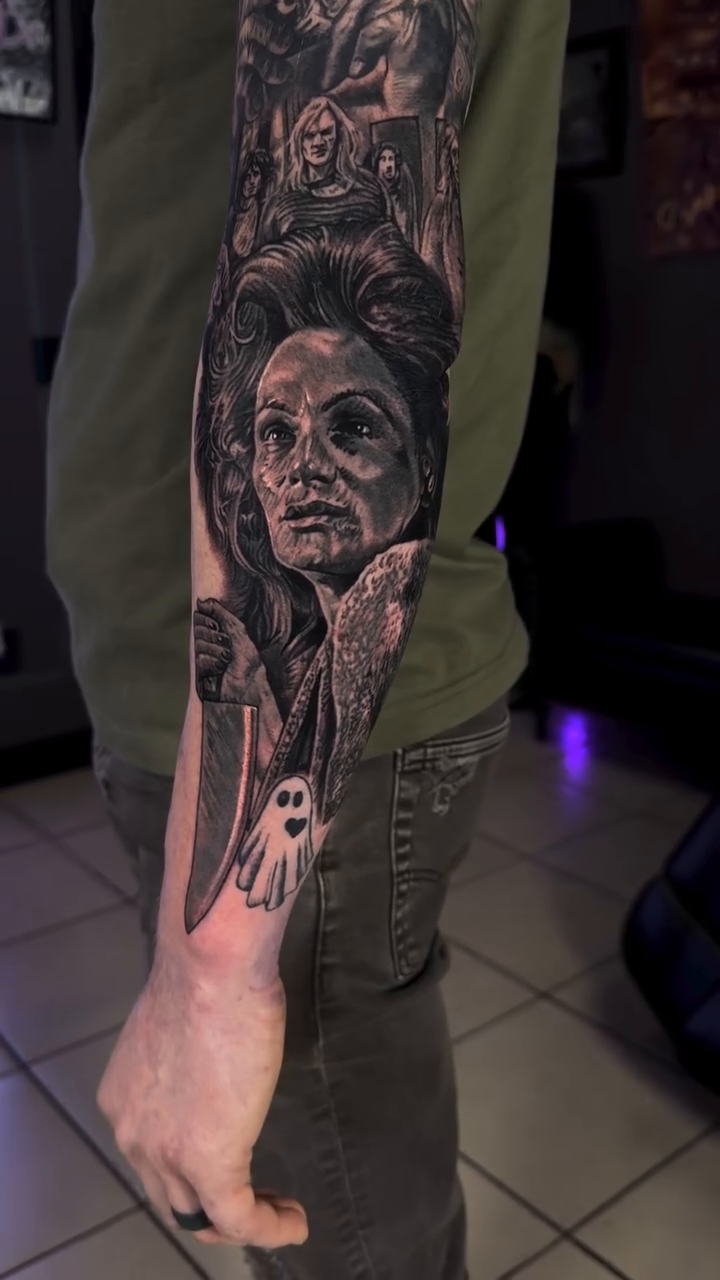Horror movie characters and scenes dark realism tattoo by Steven Pelkey, Eastpointe, Michigan