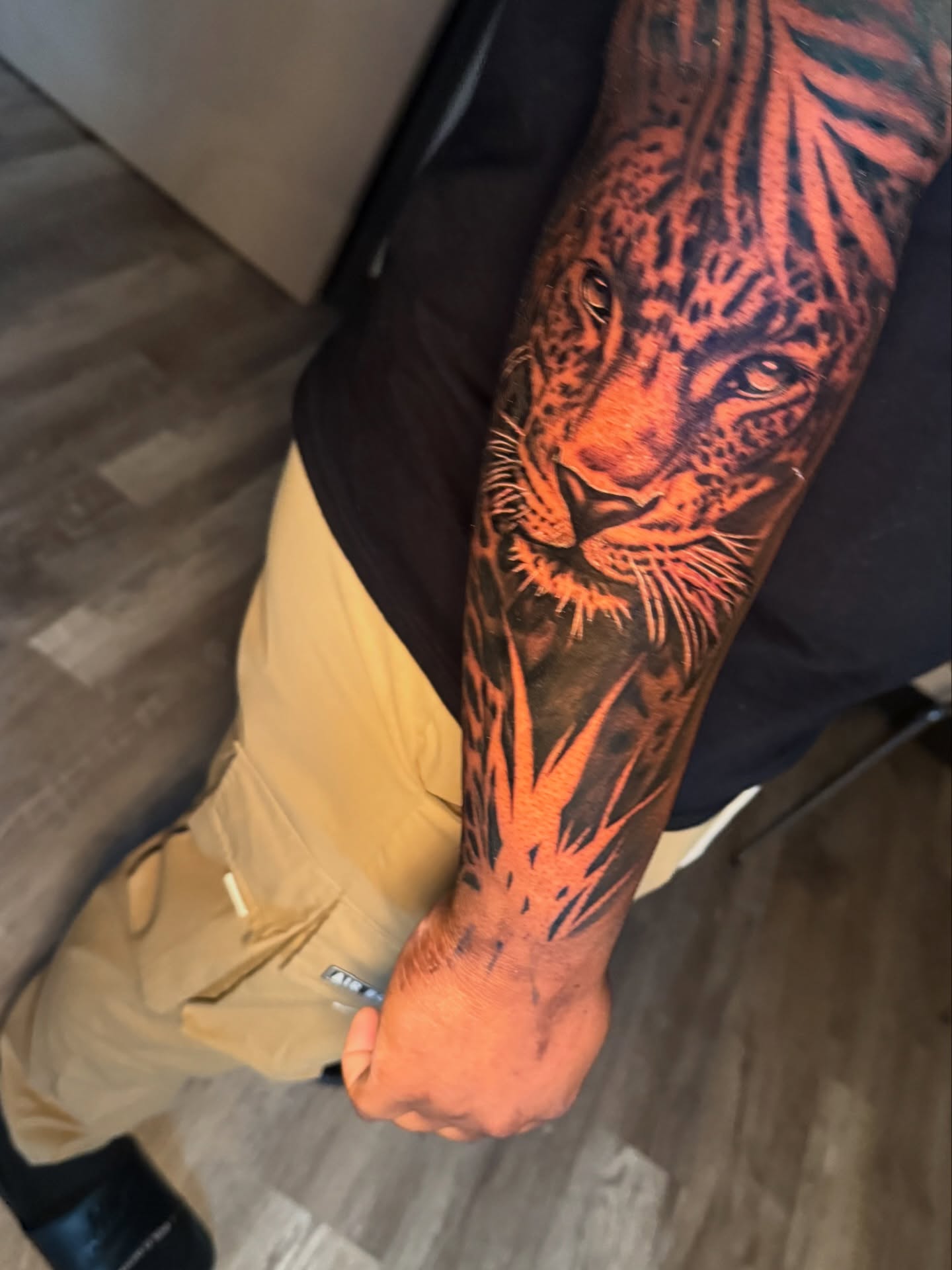 Leopard realism tattoo on the forearm by Atlanta Tattoo Artist