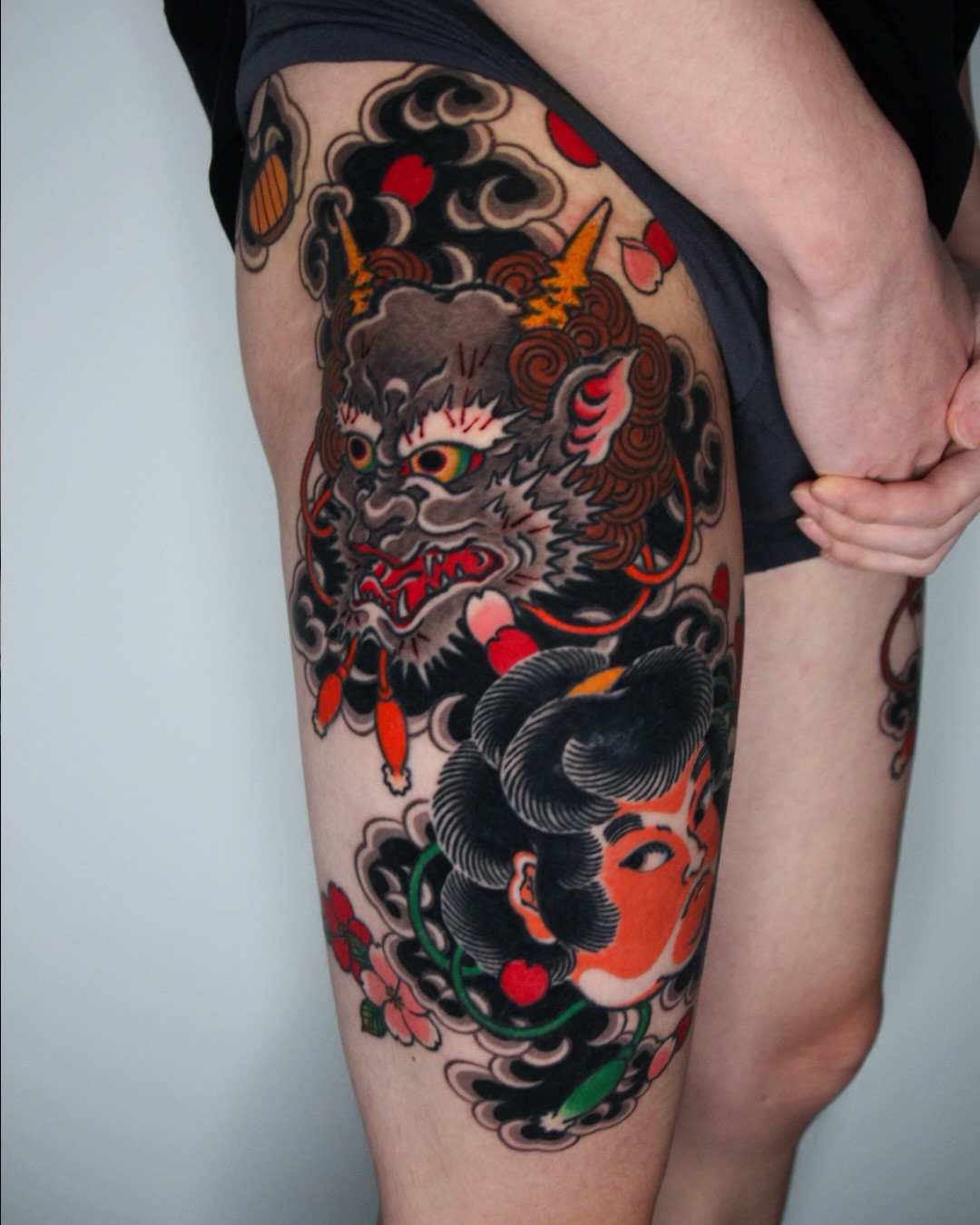 Demon and woman japanese irezumi tattoo on the thigh by 건대이레즈미