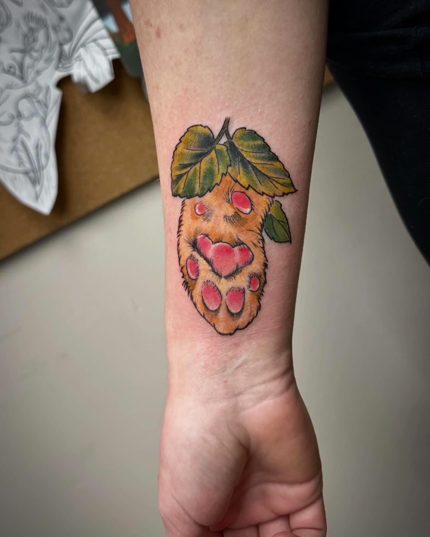 Raspberry cluster American traditional tattoo on the forearm by Heather Tattoos Danvers MA