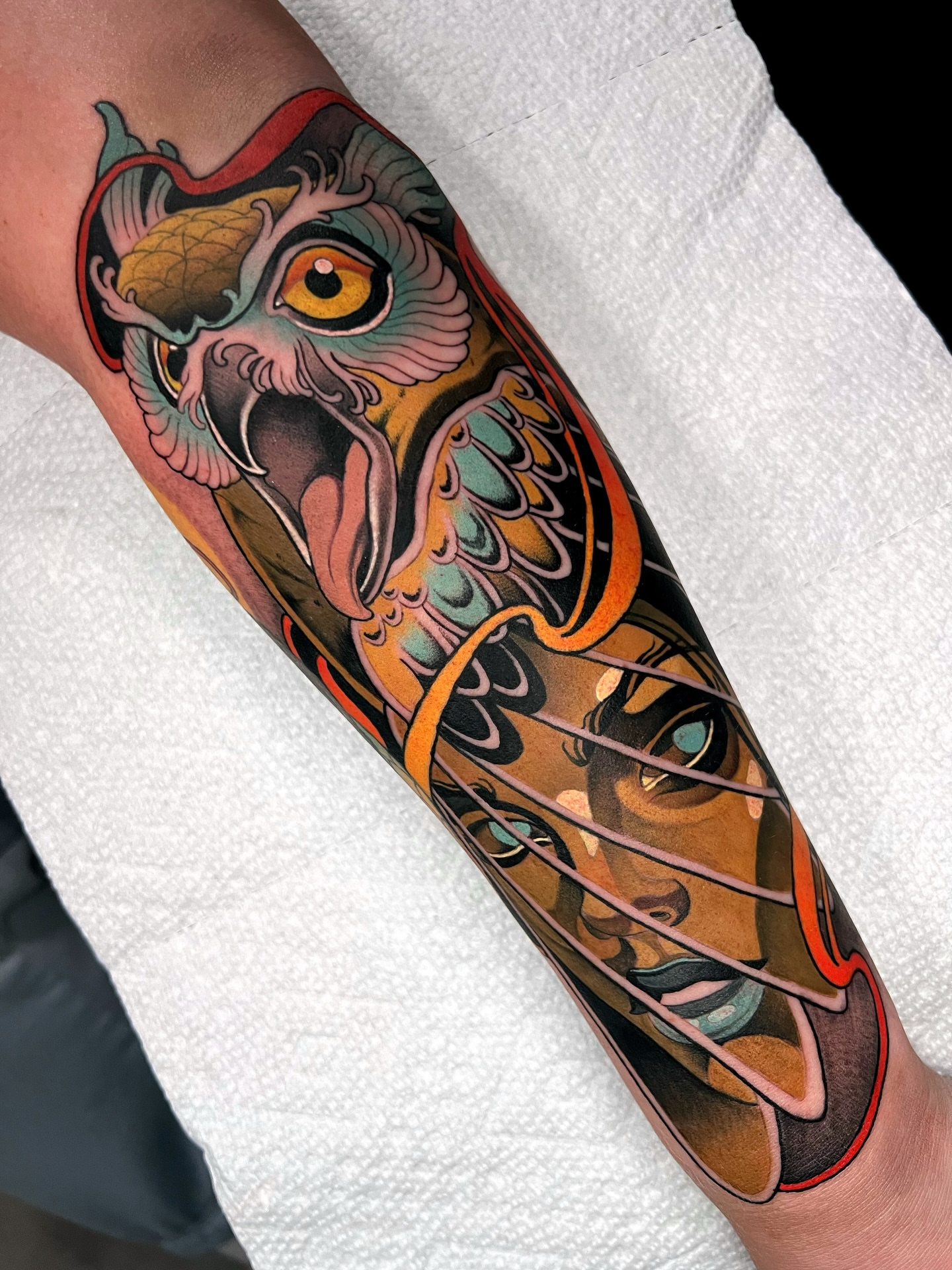 Owl American traditional tattoo on the forearm by Skyler Miller